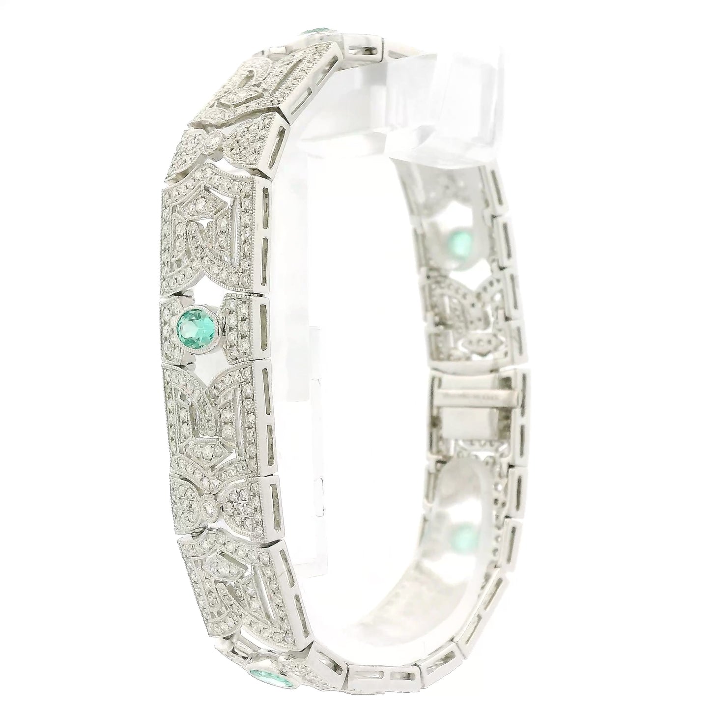 A White Gold Vintage Bracelet with bezel set oval cut natural Emeralds & natural diamonds at Forever Rox Fine Jewelry, Lake Tahoes Best Jewelry Store