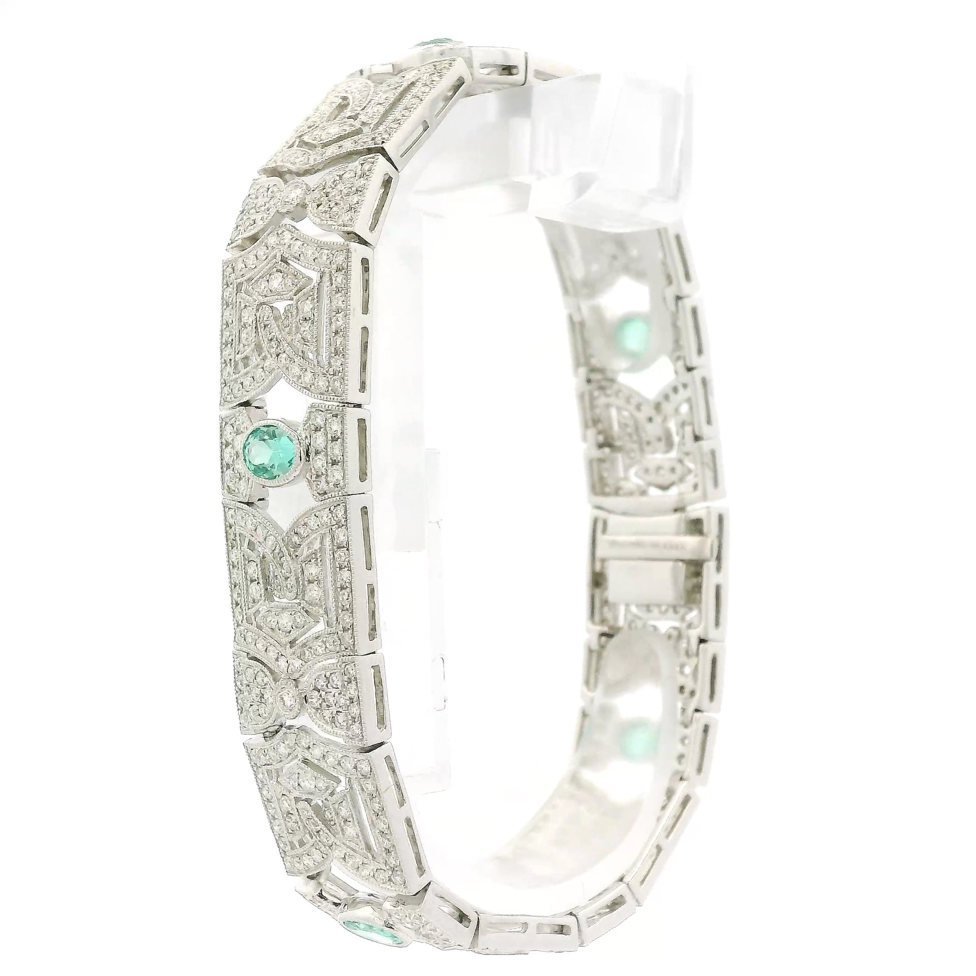 A White Gold Vintage Bracelet with bezel set oval cut natural Emeralds & natural diamonds at Forever Rox Fine Jewelry, Lake Tahoes Best Jewelry Store