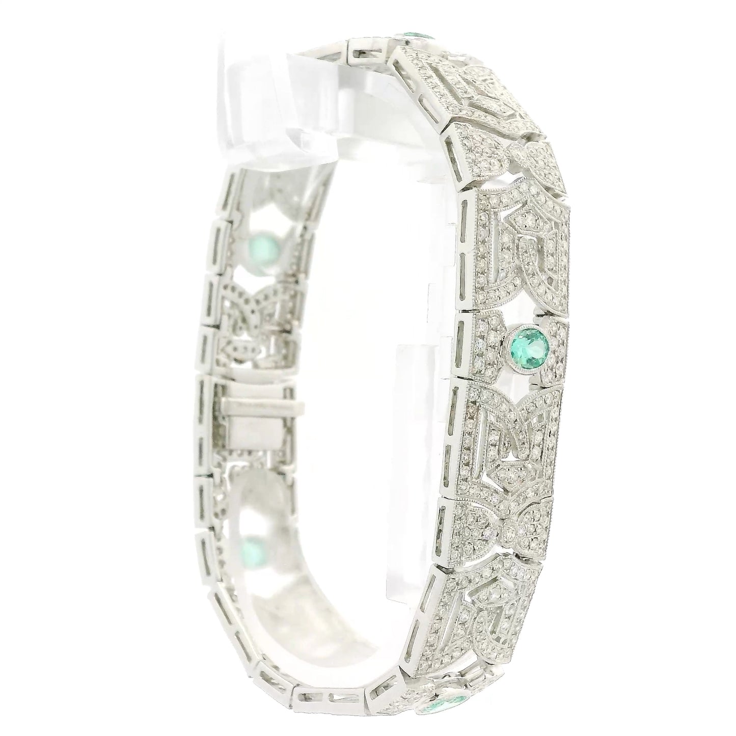 A White Gold Vintage Bracelet with bezel set oval cut natural Emeralds & natural diamonds at Forever Rox Fine Jewelry, Lake Tahoes Best Jewelry Store
