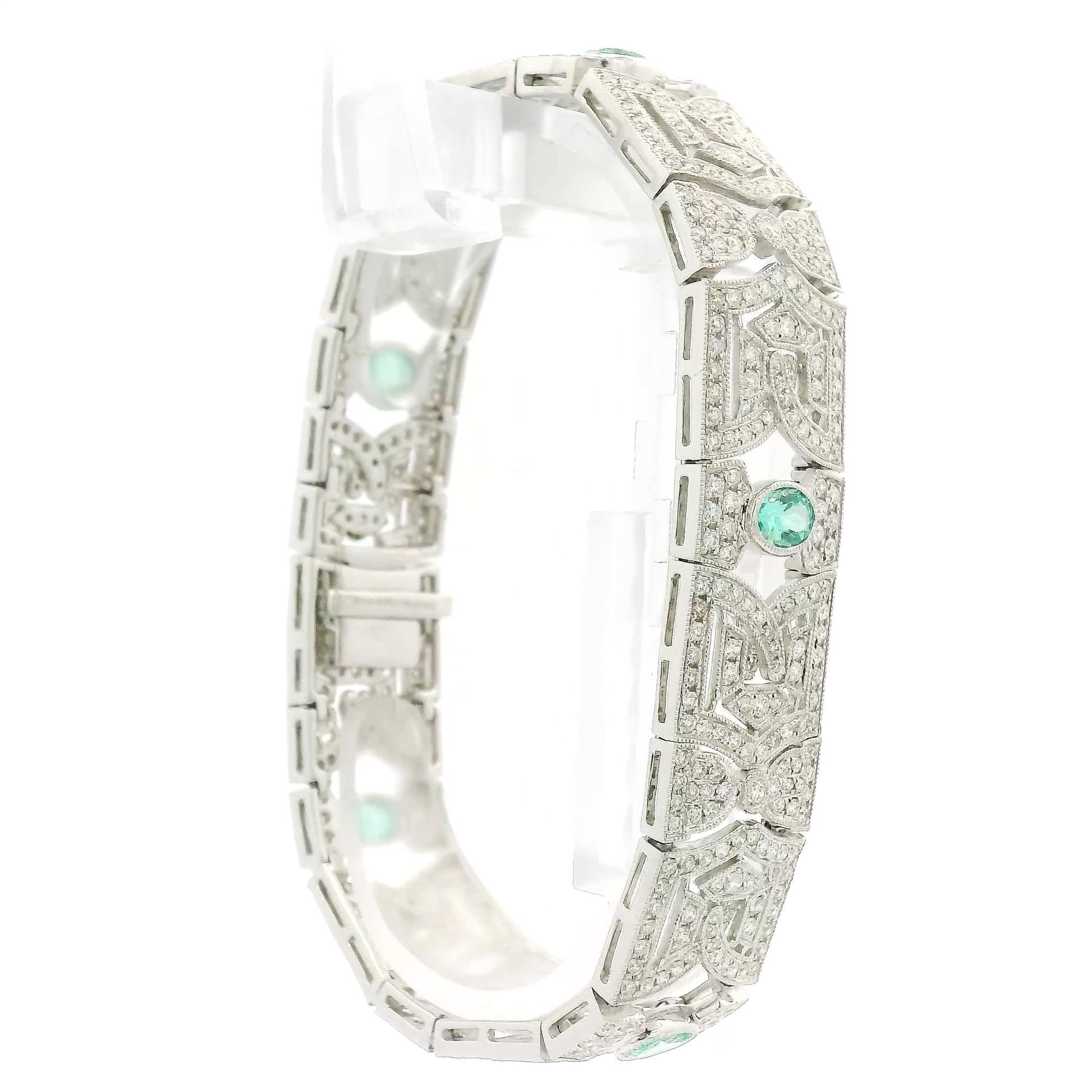 A White Gold Vintage Bracelet with bezel set oval cut natural Emeralds & natural diamonds at Forever Rox Fine Jewelry, Lake Tahoes Best Jewelry Store