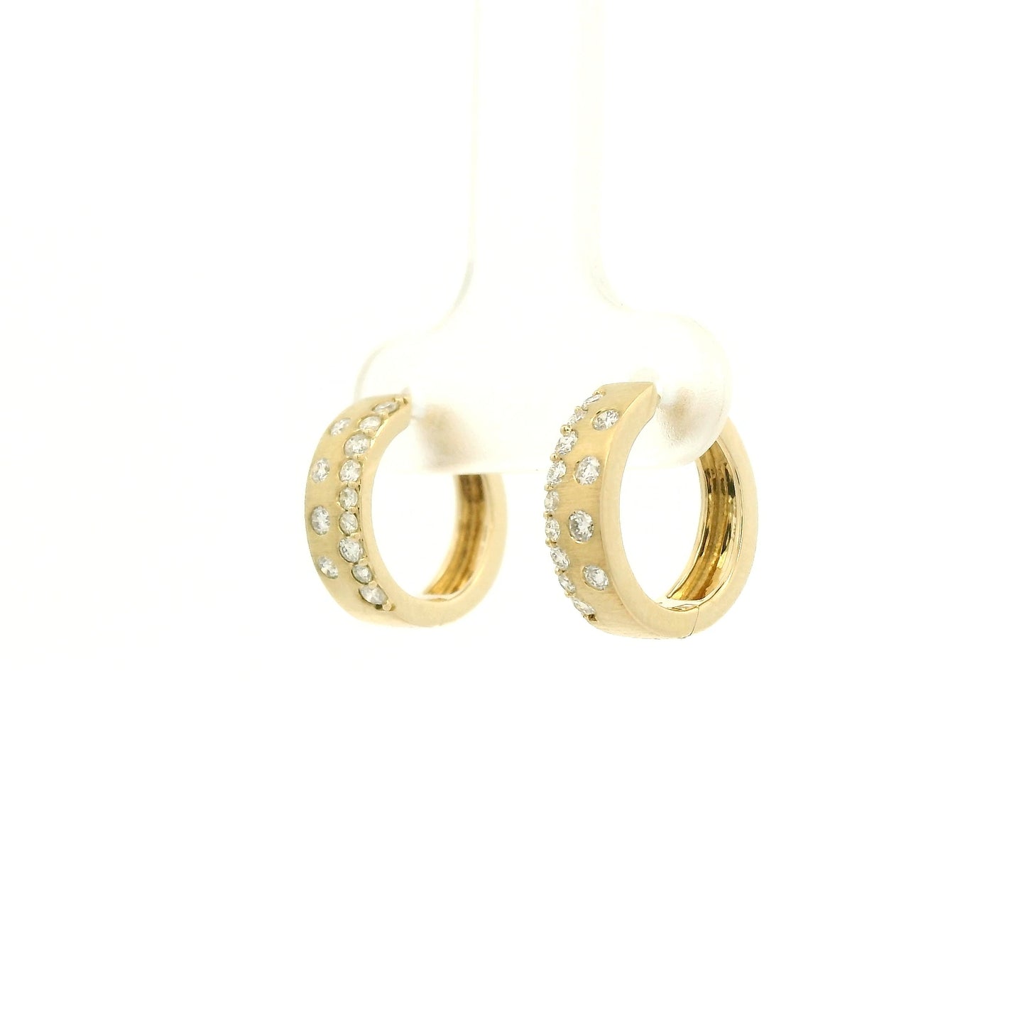A Pair of Yellow Gold Hoop Earrings with flush set round cut natural Diamonds at Forever Rox Fine Jewelry, Lake Tahoes Best Jewelry Store