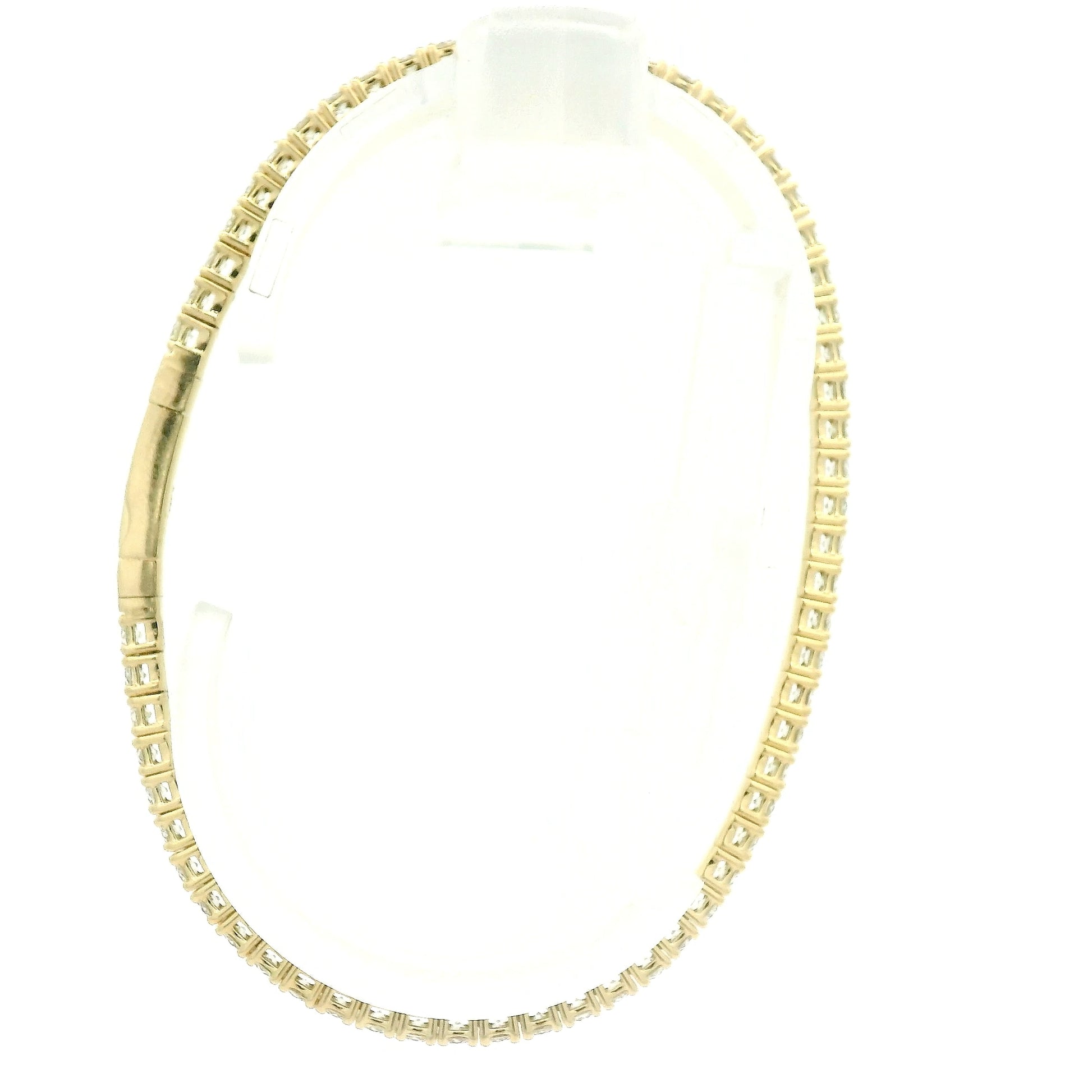 A Yellow Gold flex diamond bangle bracelet with diamonds all the way around at Forever Rox Fine Jewelry, Lake Tahoes Best Jewelry Store
