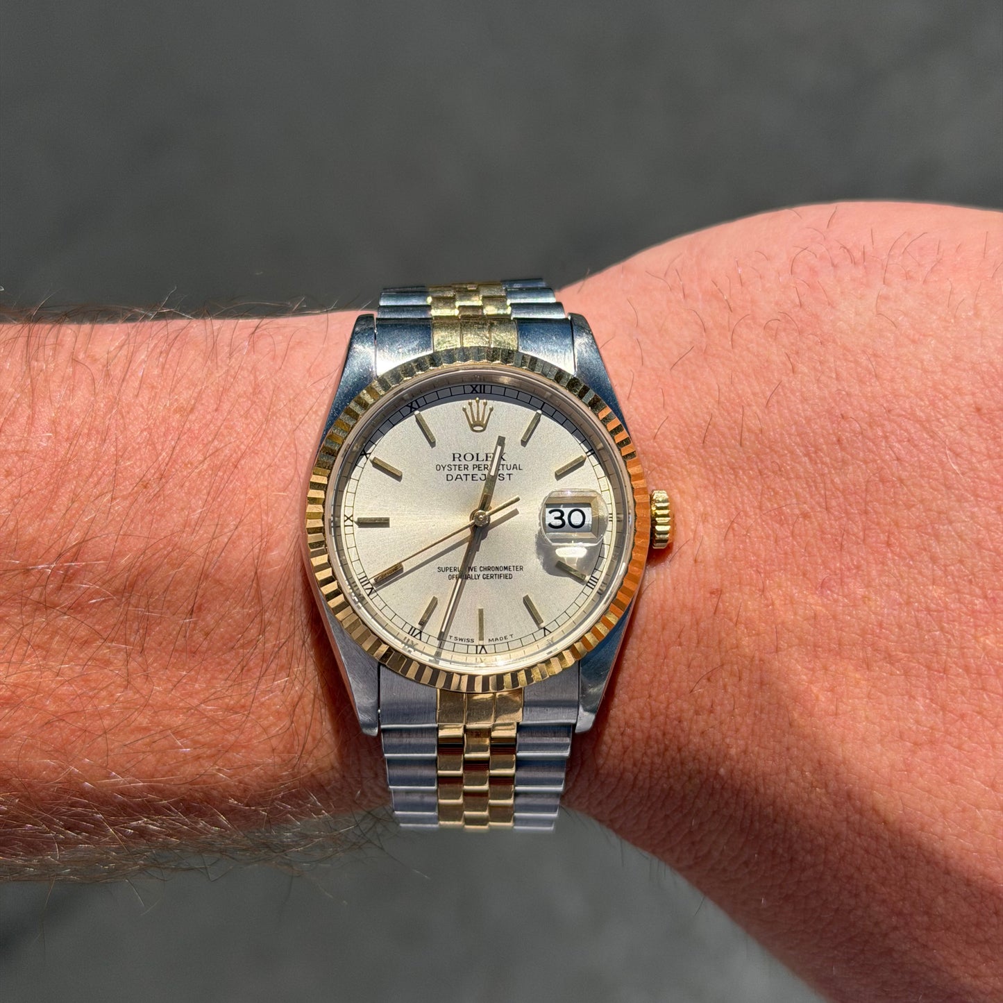 Rolex Datejust wristwatch with a two-tone stainless steel and yellow gold Jubilee bracelet, featuring a patinaed champagne dial and fluted bezel at Forever Rox Fine Jewelry, Lake Tahoes Best Jewelry Store