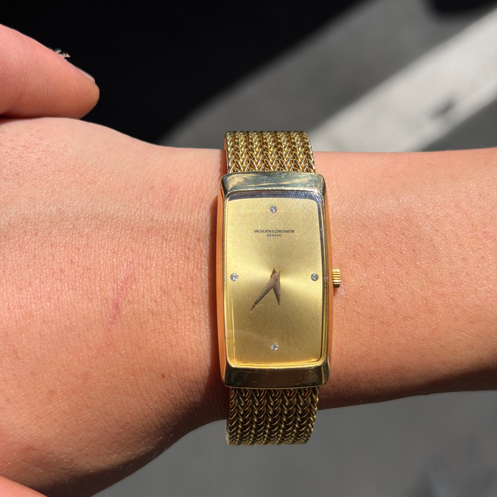 A vintage 18k yellow gold women's Vacheron Constantin watch with a rectangular bezel, gold dial, and a matching gold mesh bracelet, shown against a plain white background at Forever Rox Fine Jewelry, Lake Tahoes Best Jewelry Store