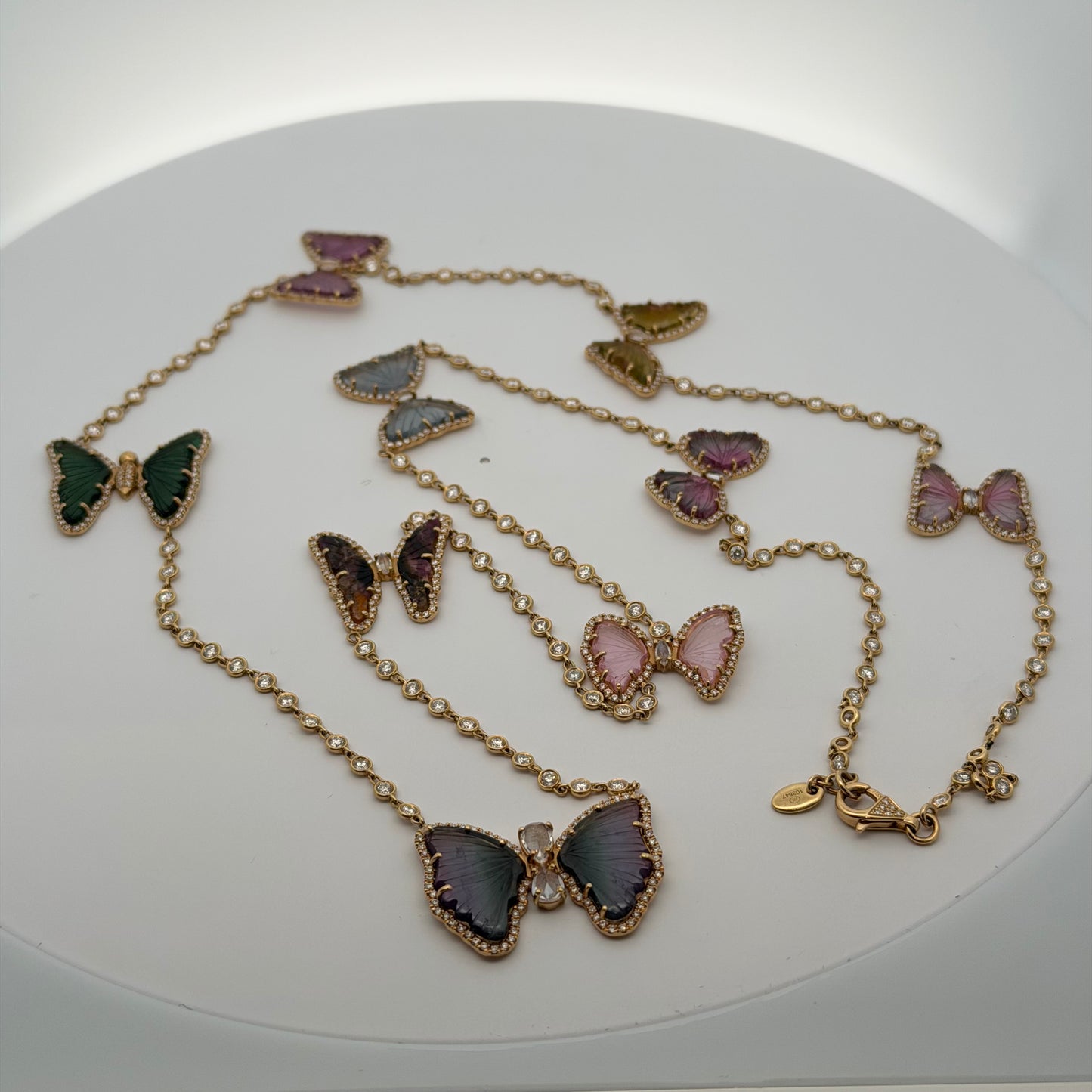 A Yellow Gold Diamond by The Yard Necklace with a 9 tourmaline & diamond butterflies at Forever Rox Fine Jewelry, Lake Tahoes Best Jewelry Store
