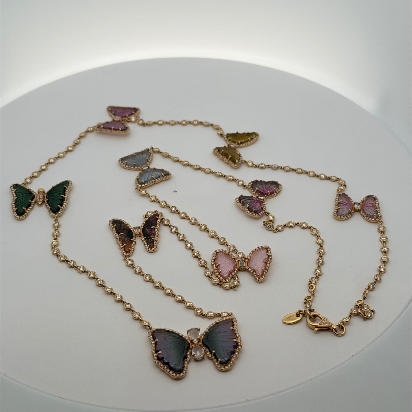 A Yellow Gold Diamond by The Yard Necklace with a 9 tourmaline & diamond butterflies at Forever Rox Fine Jewelry, Lake Tahoes Best Jewelry Store

