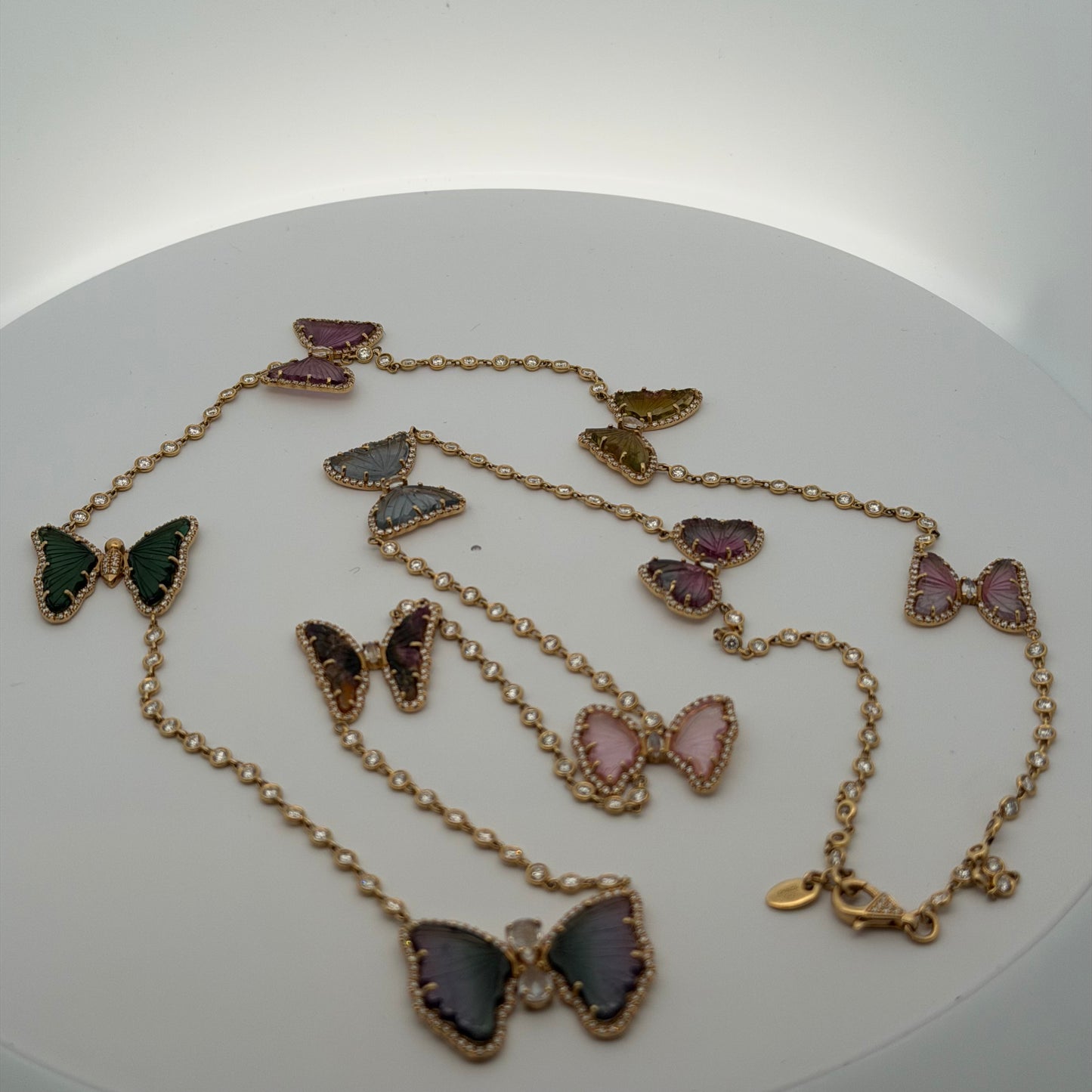 A Yellow Gold Diamond by The Yard Necklace with a 9 tourmaline & diamond butterflies at Forever Rox Fine Jewelry, Lake Tahoes Best Jewelry Store
