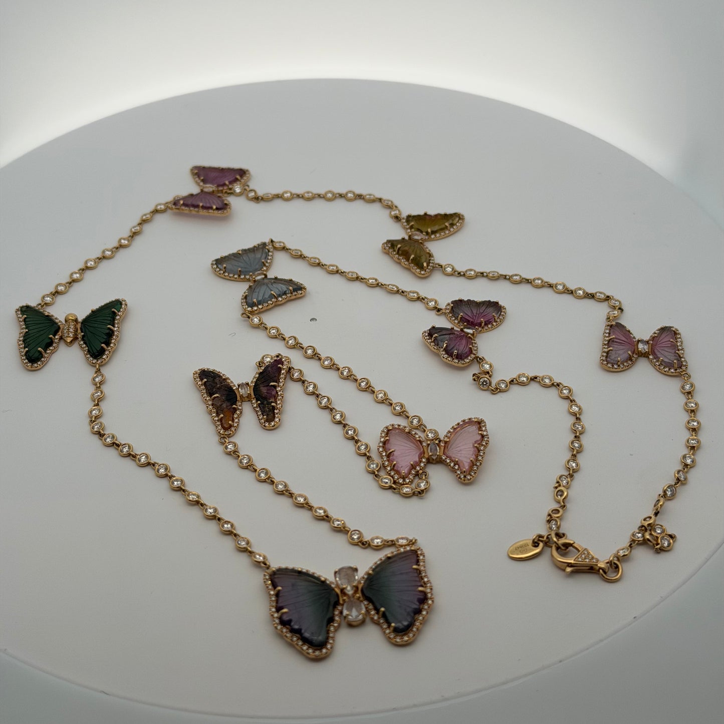 A Yellow Gold Diamond by The Yard Necklace with a 9 tourmaline & diamond butterflies at Forever Rox Fine Jewelry, Lake Tahoes Best Jewelry Store

