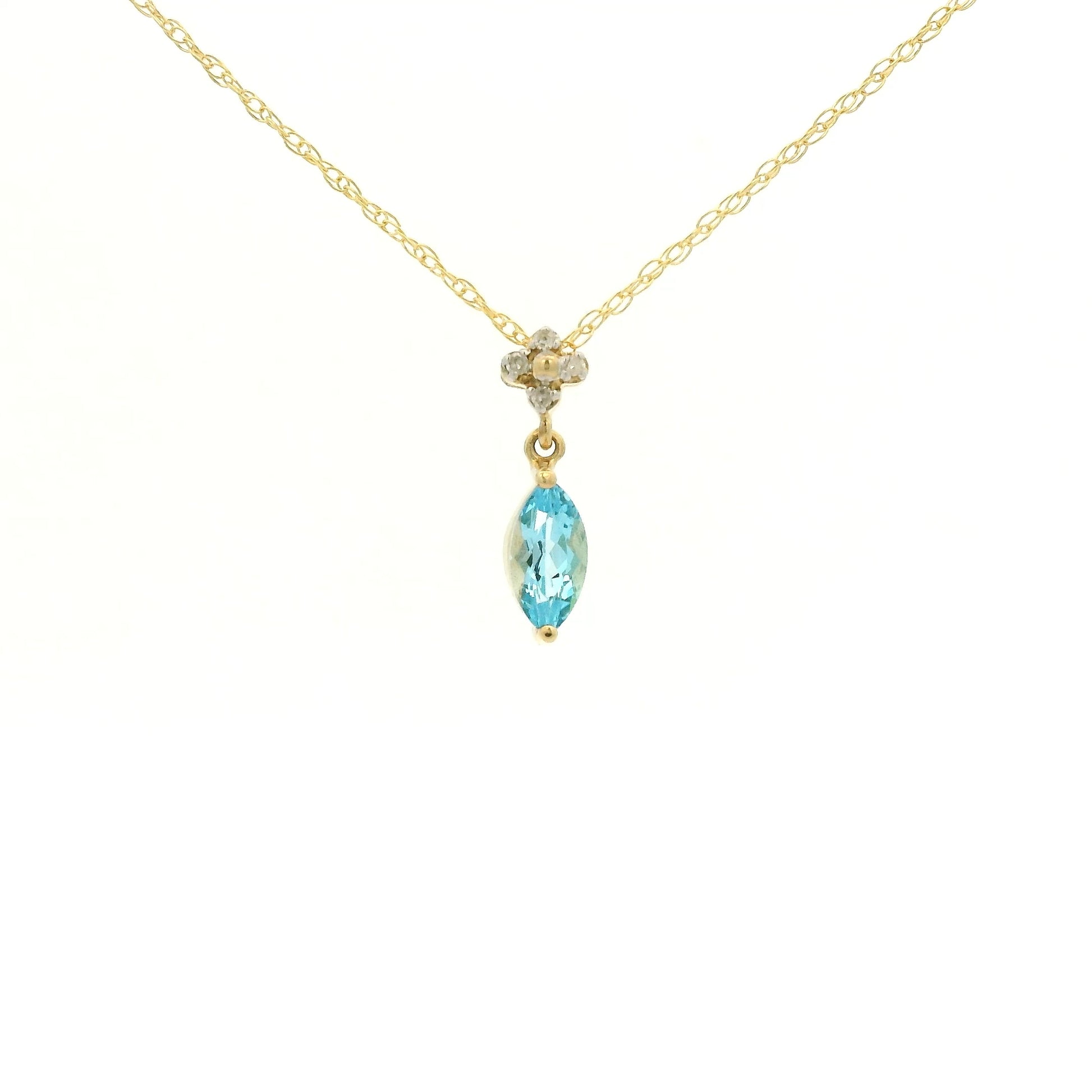 Yellow Gold Pendant with a prong set marquise cut natural Blue Topaz in the center with 4 diamonds at Forever Rox Fine Jewelry, Lake Tahoes Best Jewelry Store
