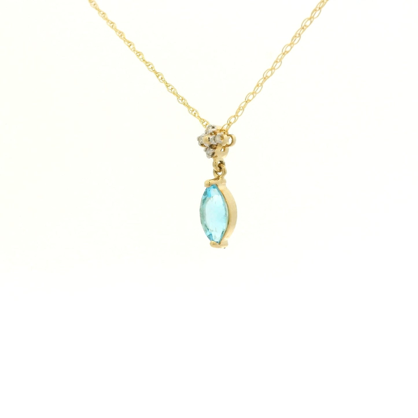 Yellow Gold Pendant with a prong set marquise cut natural Blue Topaz in the center with 4 diamonds at Forever Rox Fine Jewelry, Lake Tahoes Best Jewelry Store
