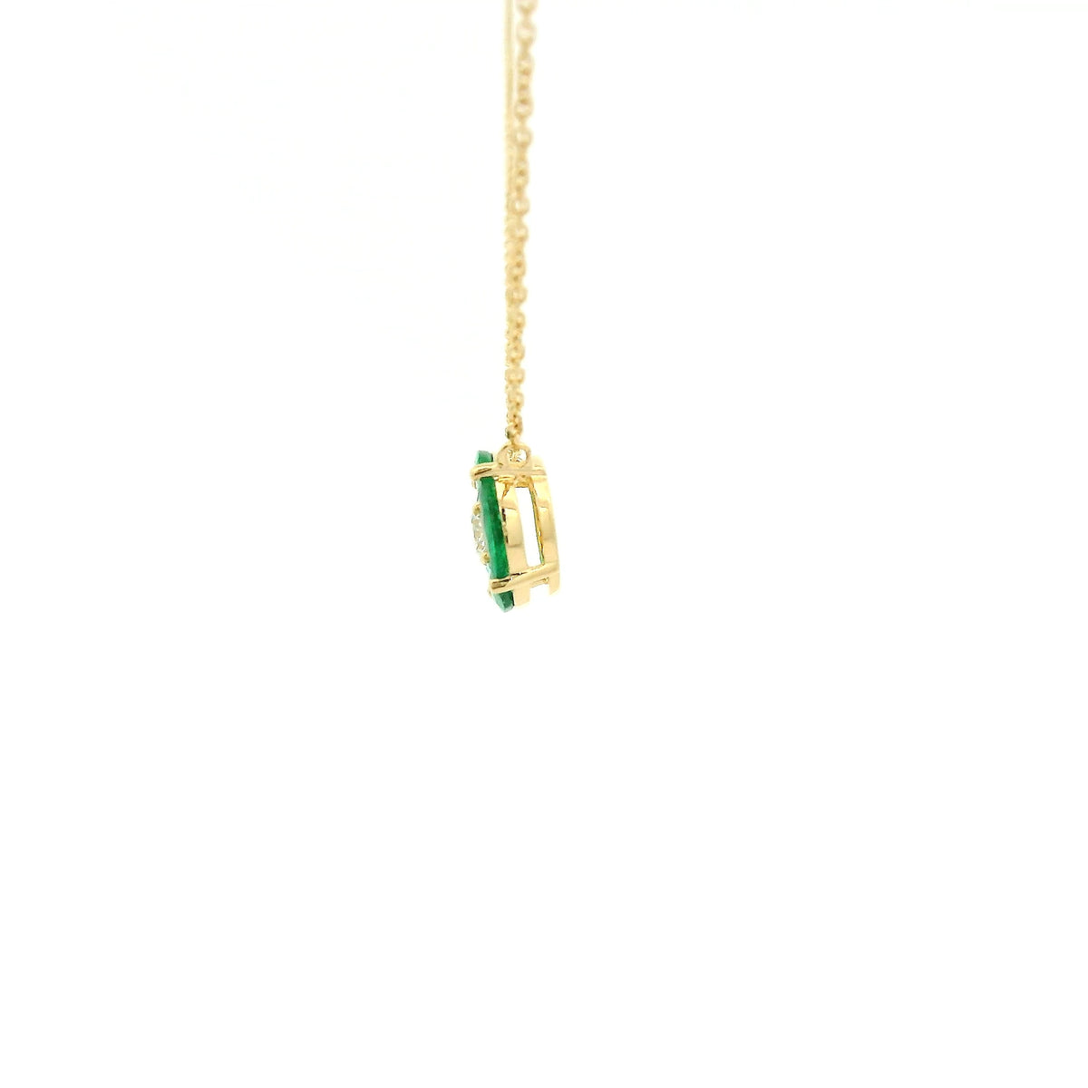 A Yellow Gold Pendant with a round cut diamond in the center & 4 marquise cut emeralds in a circle around it at Forever Rox Fine Jewelry, Lake Tahoes Best Jewelry Store