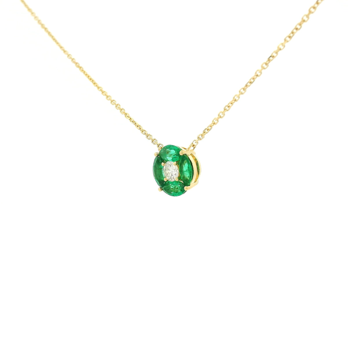 A Yellow Gold Pendant with a round cut diamond in the center & 4 marquise cut emeralds in a circle around it at Forever Rox Fine Jewelry, Lake Tahoes Best Jewelry Store