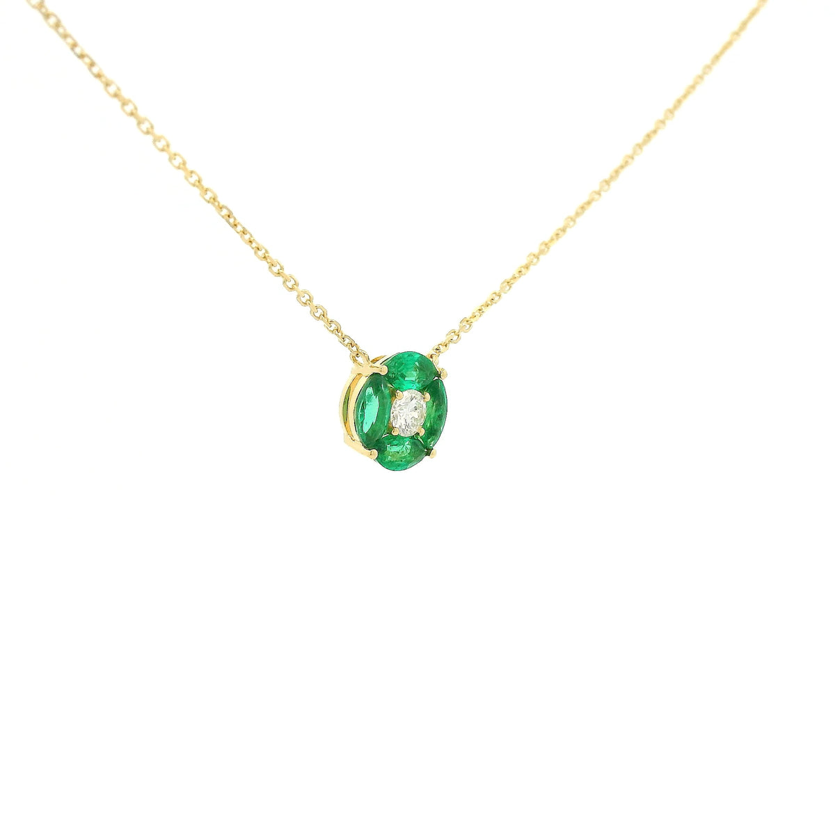 A Yellow Gold Pendant with a round cut diamond in the center & 4 marquise cut emeralds in a circle around it at Forever Rox Fine Jewelry, Lake Tahoes Best Jewelry Store