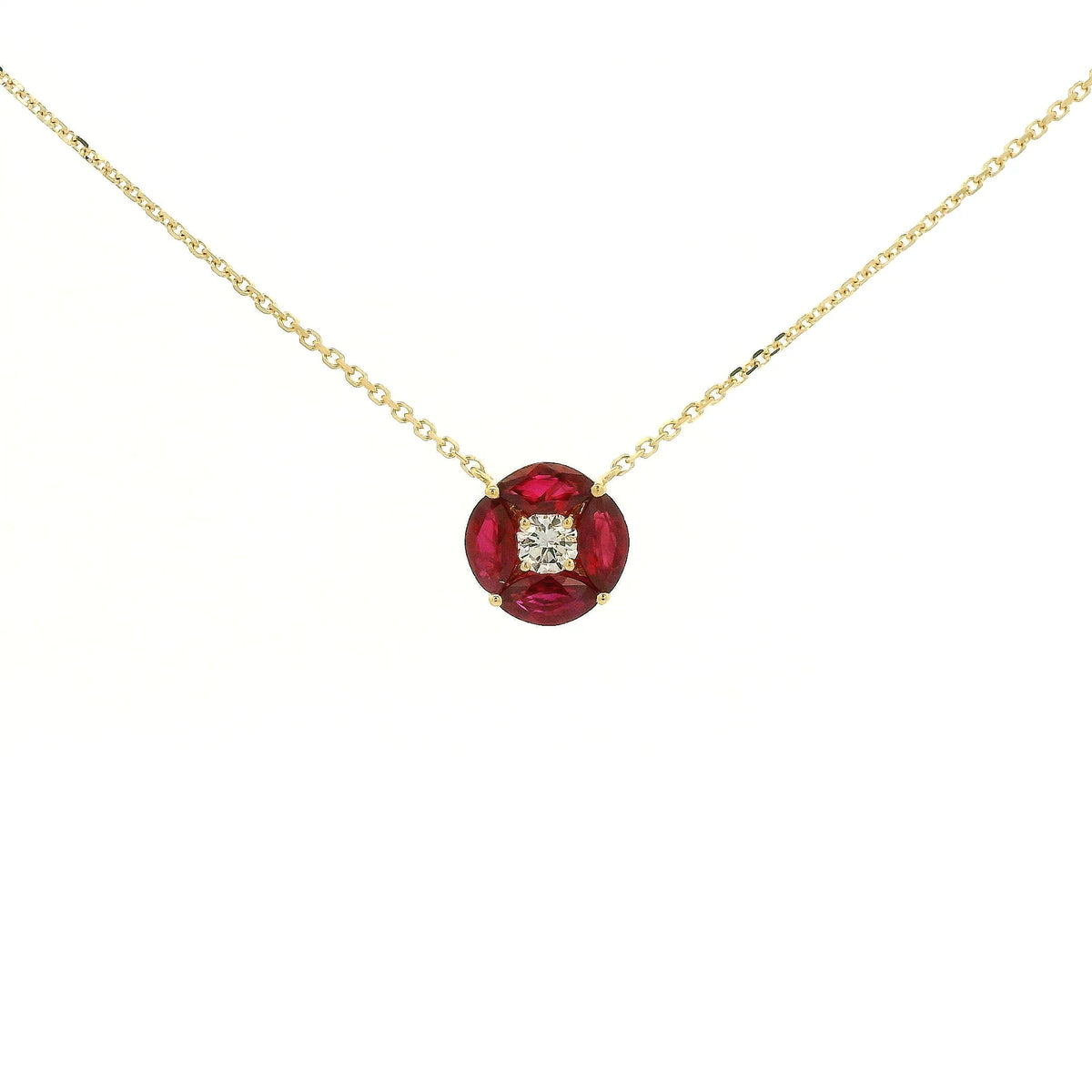 A Yellow Gold Pendant with a round cut diamond in the center & 4 marquise cut rubies in a circle around it at Forever Rox Fine Jewelry, Lake Tahoes Best Jewelry Store