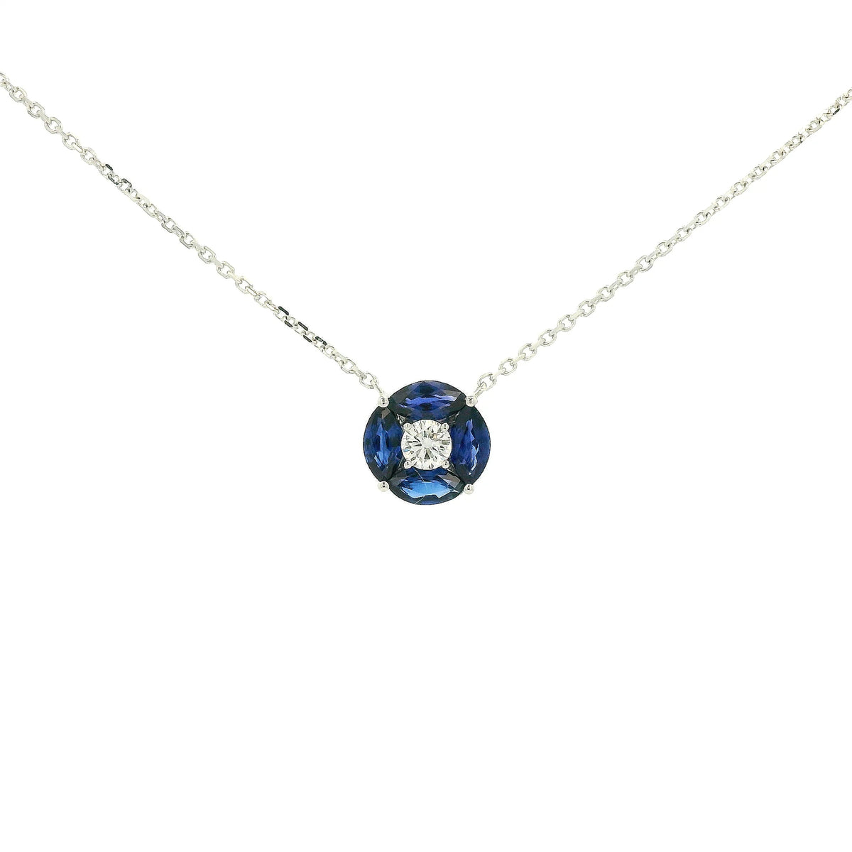 A White Gold Pendant with a round cut diamond in the center & 4 marquise cut Sapphires in a circle around it at Forever Rox Fine Jewelry, Lake Tahoes Best Jewelry Store