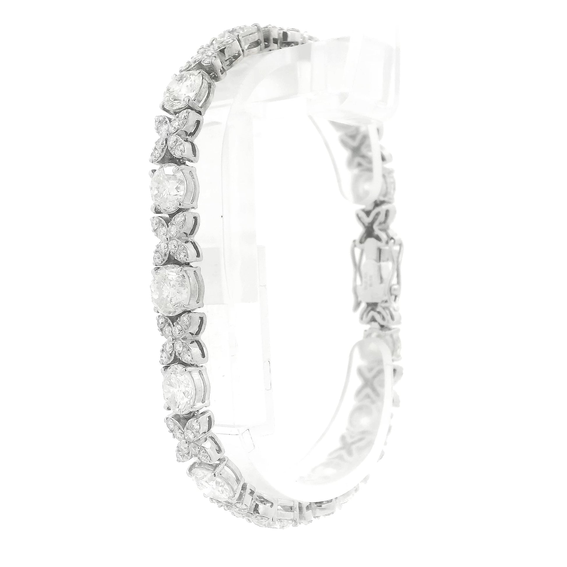 A White Gold X&O with round cut diamonds for the O and melle round cut diamonds for the X at Forever Rox Fine Jewelry, Lake Tahoes Best Jewelry Store
