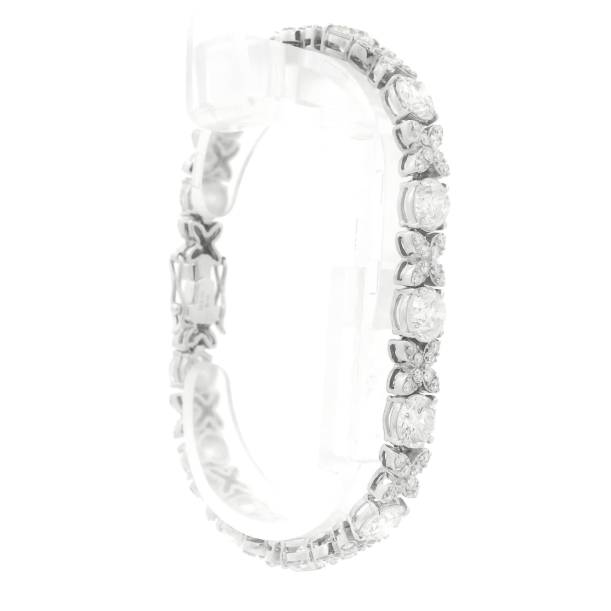 A White Gold X&O with round cut diamonds for the O and melle round cut diamonds for the X at Forever Rox Fine Jewelry, Lake Tahoes Best Jewelry Store
