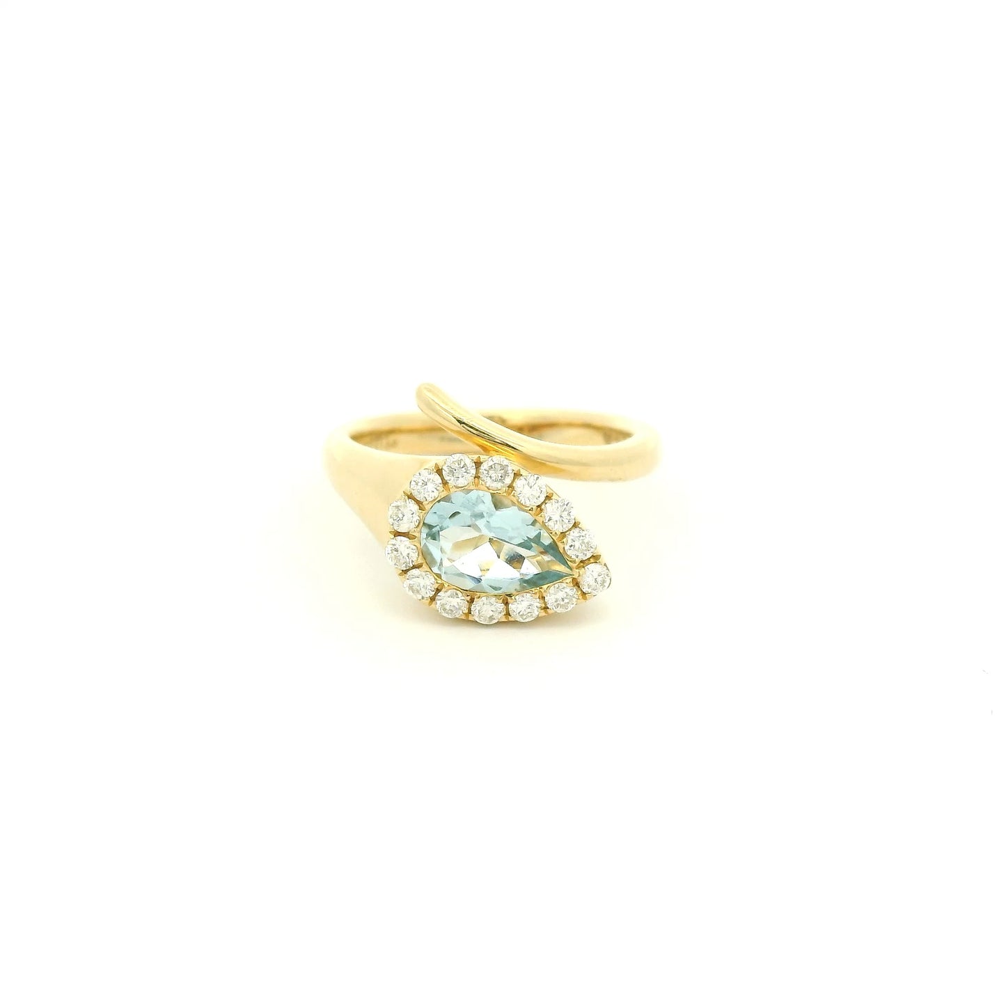 A Yellow Gold Ring with a bezel set pear cut natural Aquamarine in the center with a halo fo diamonds at Forever Rox Fine Jewelry, Lake Tahoes Best Jewelry Store