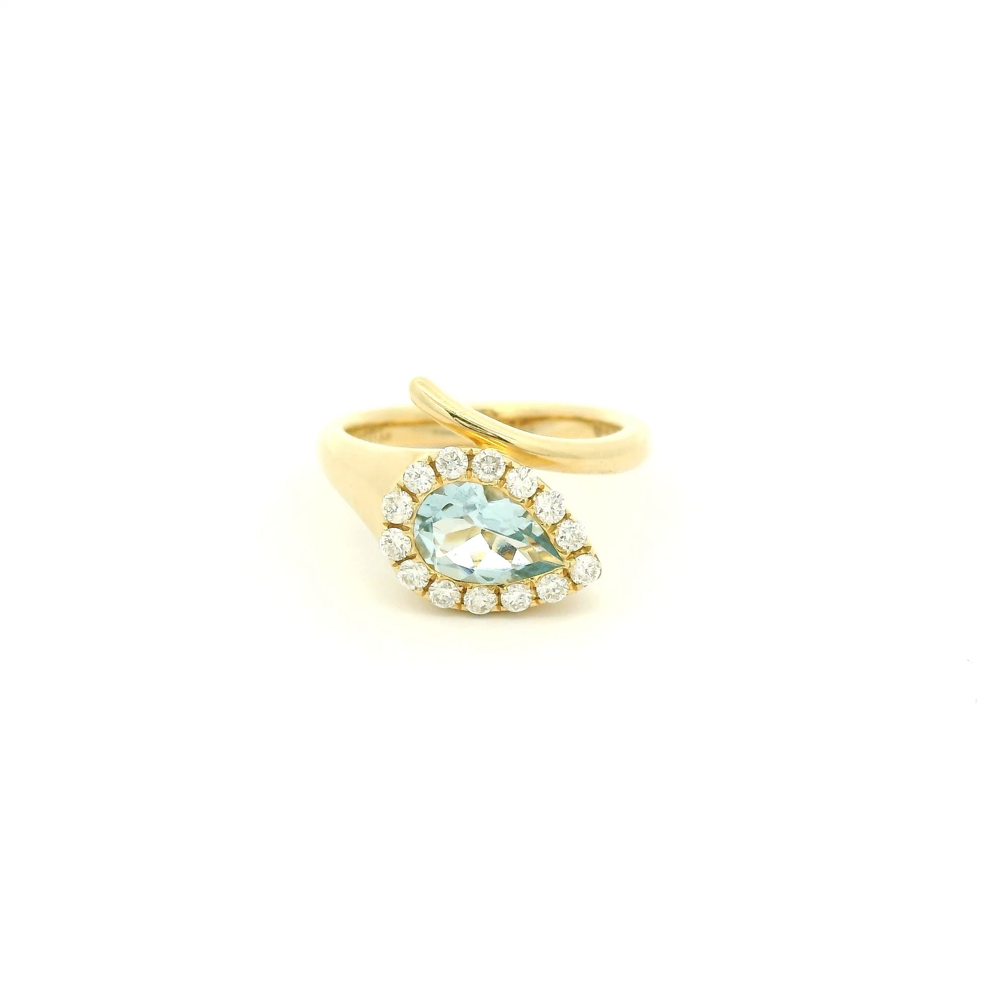 A Yellow Gold Ring with a bezel set pear cut natural Aquamarine in the center with a halo fo diamonds at Forever Rox Fine Jewelry, Lake Tahoes Best Jewelry Store