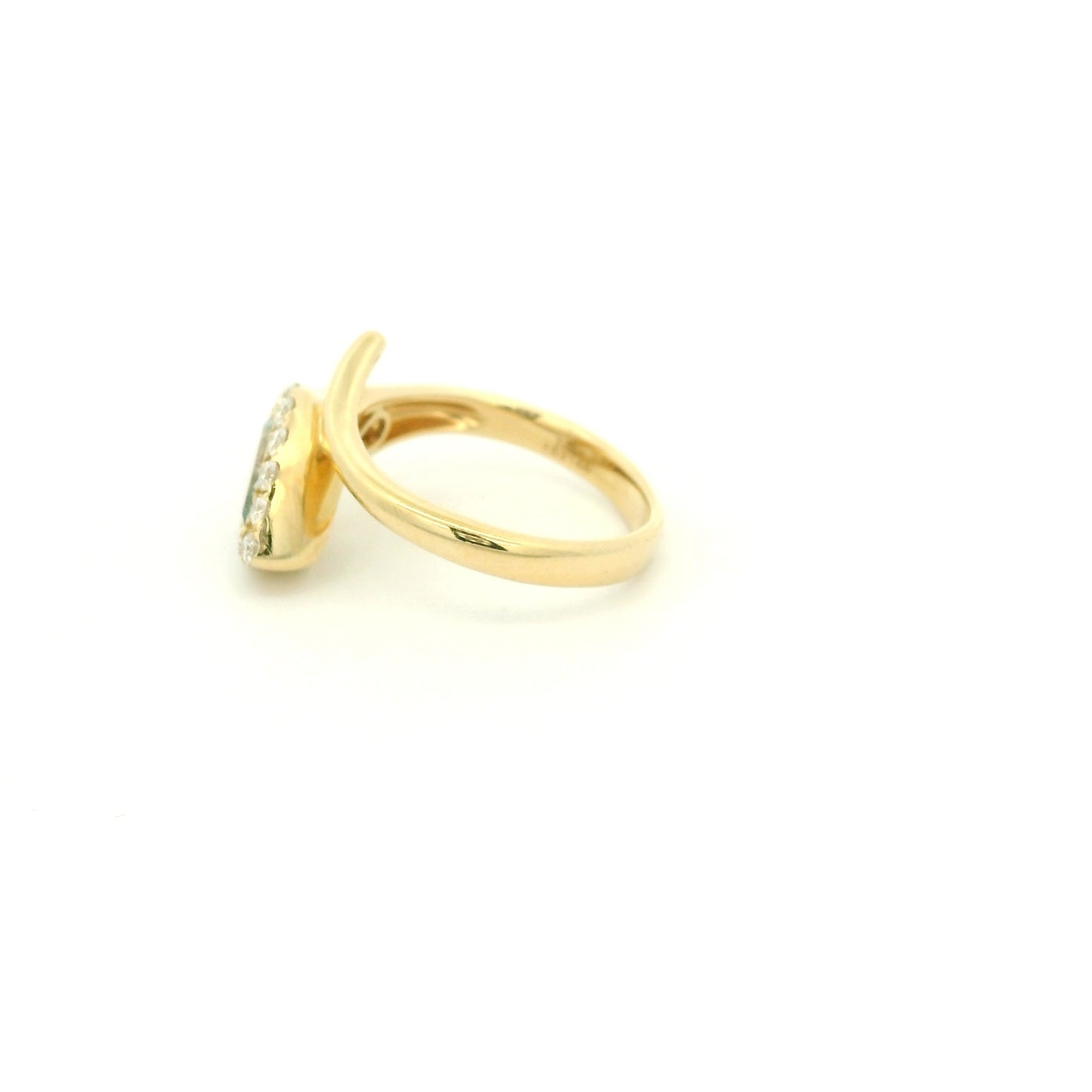 A Yellow Gold Ring with a bezel set pear cut natural Aquamarine in the center with a halo fo diamonds at Forever Rox Fine Jewelry, Lake Tahoes Best Jewelry Store