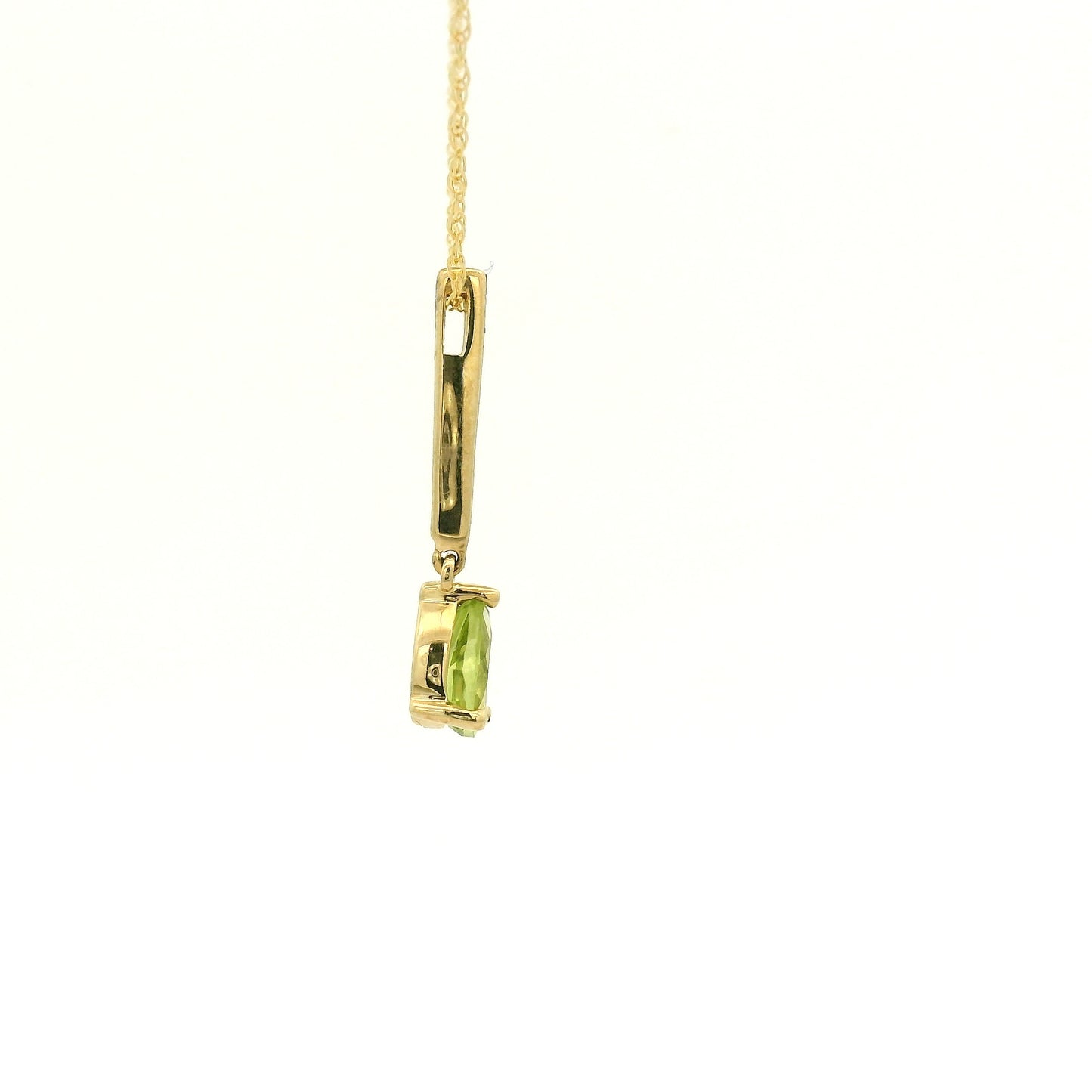 Yellow Gold Dangle Pendant with a prong set pear cut natural Peridot at Forever Rox Fine Jewelry, Lake Tahoes Best Jewelry Store
