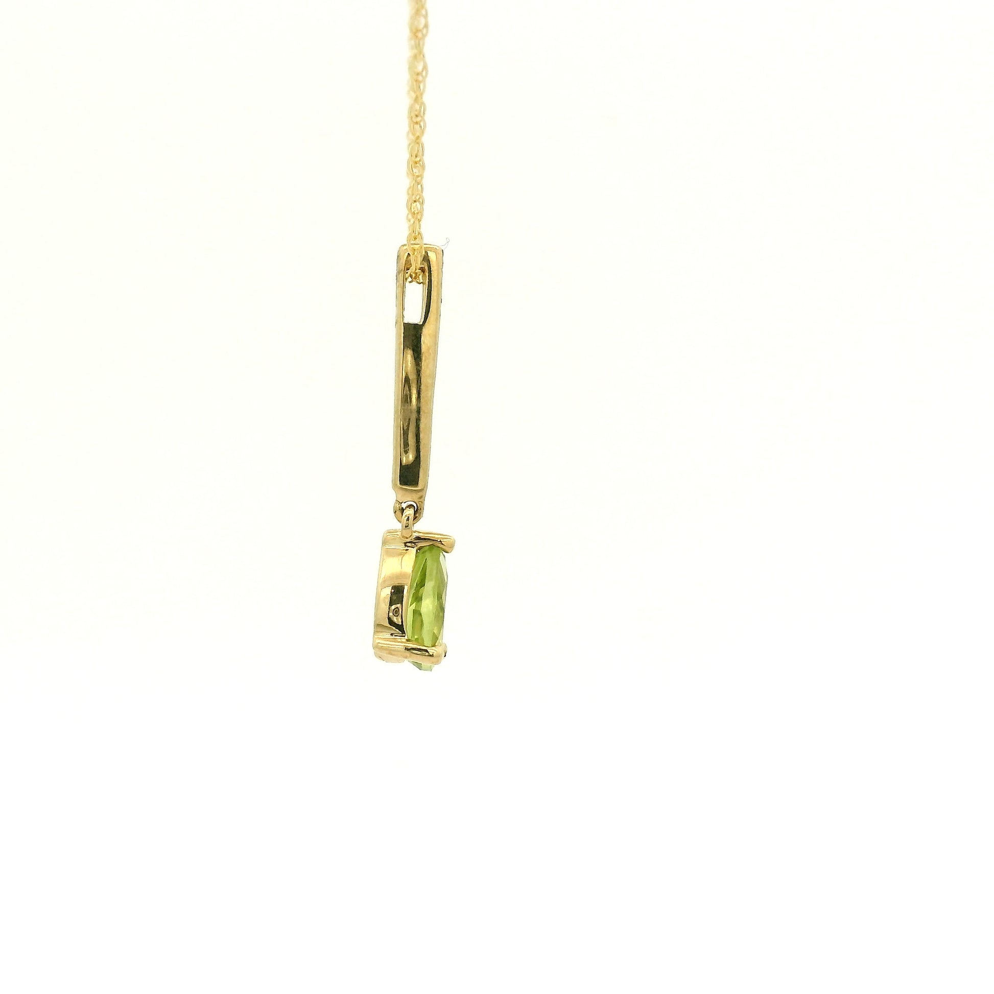 Yellow Gold Dangle Pendant with a prong set pear cut natural Peridot at Forever Rox Fine Jewelry, Lake Tahoes Best Jewelry Store
