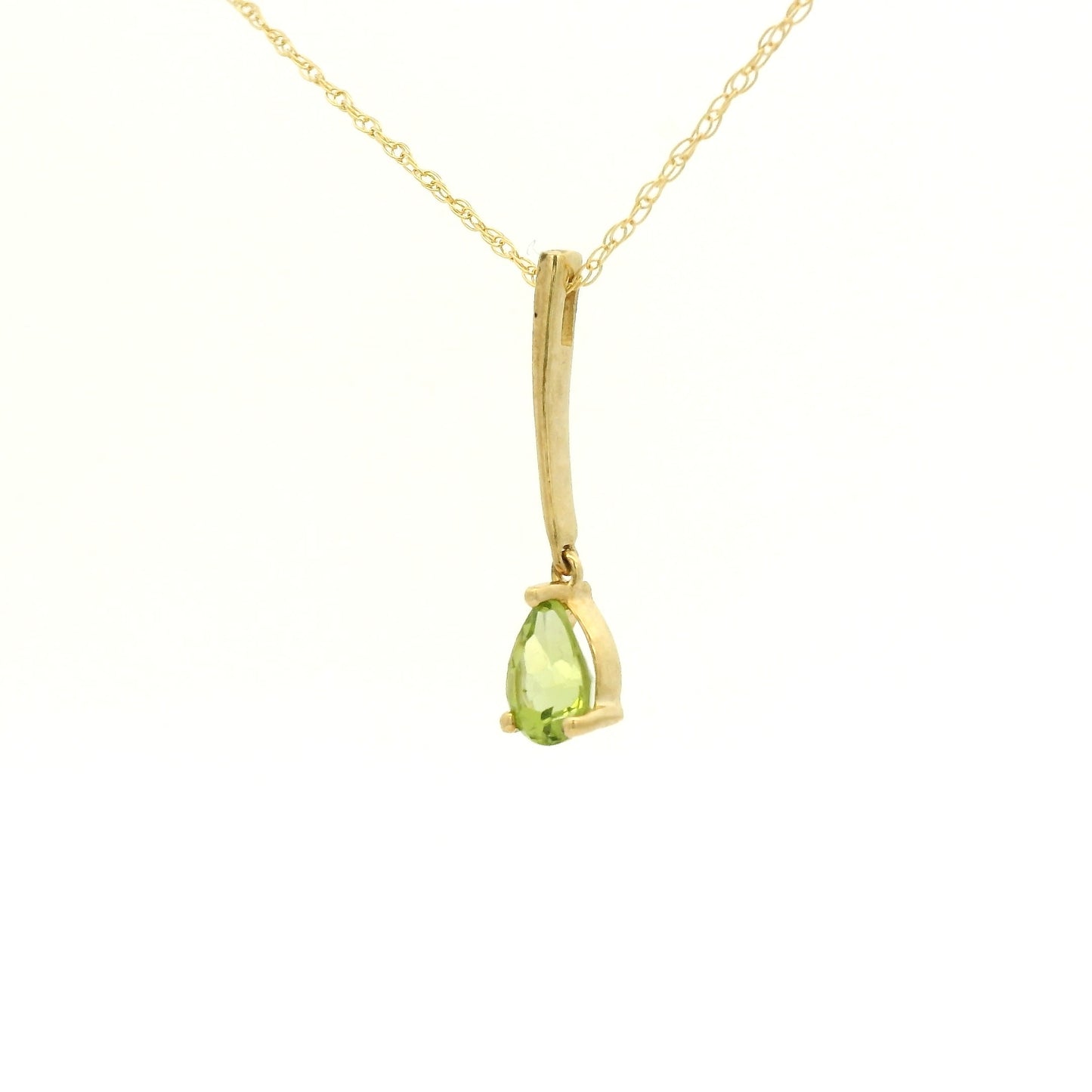 Yellow Gold Dangle Pendant with a prong set pear cut natural Peridot at Forever Rox Fine Jewelry, Lake Tahoes Best Jewelry Store
