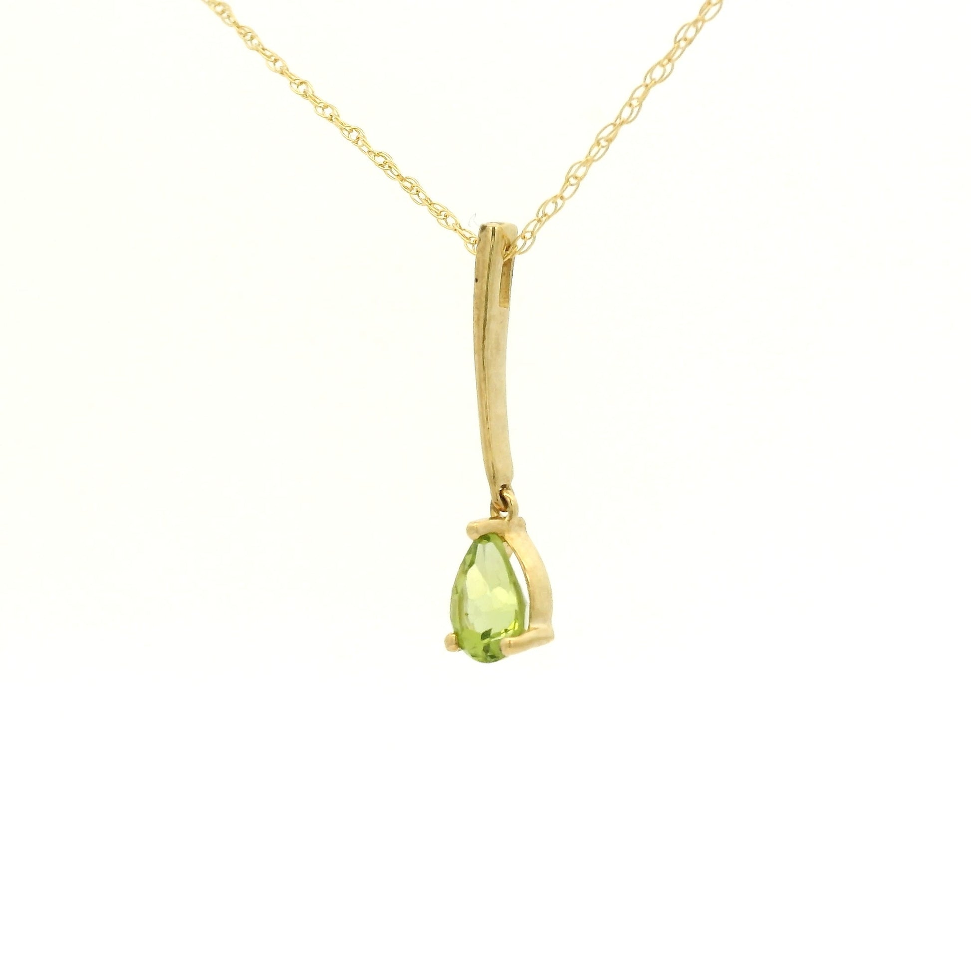 Yellow Gold Dangle Pendant with a prong set pear cut natural Peridot at Forever Rox Fine Jewelry, Lake Tahoes Best Jewelry Store
