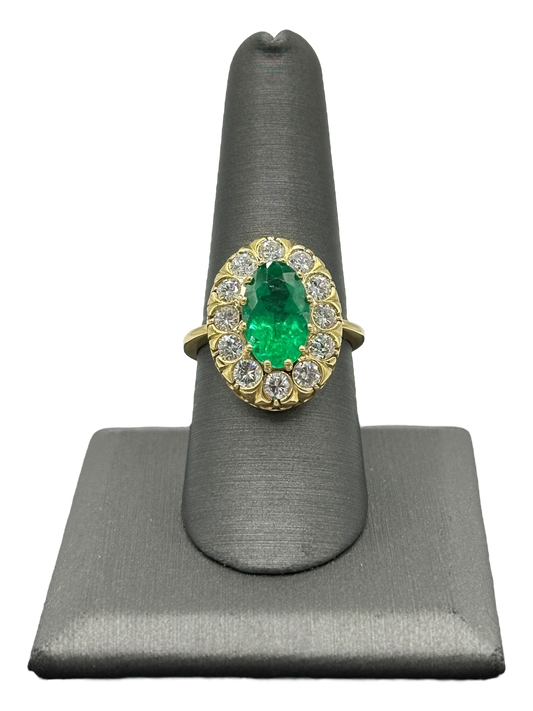 Oval Cut Emerald Ring With Diamond Halo