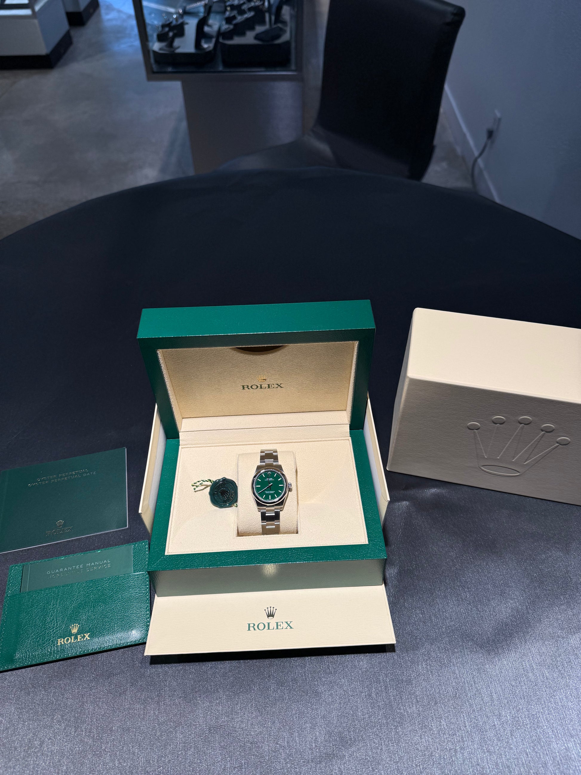 Stainless Steel Rolex Oyster Perpetual with Green Dial at Forever Rox Jewelry