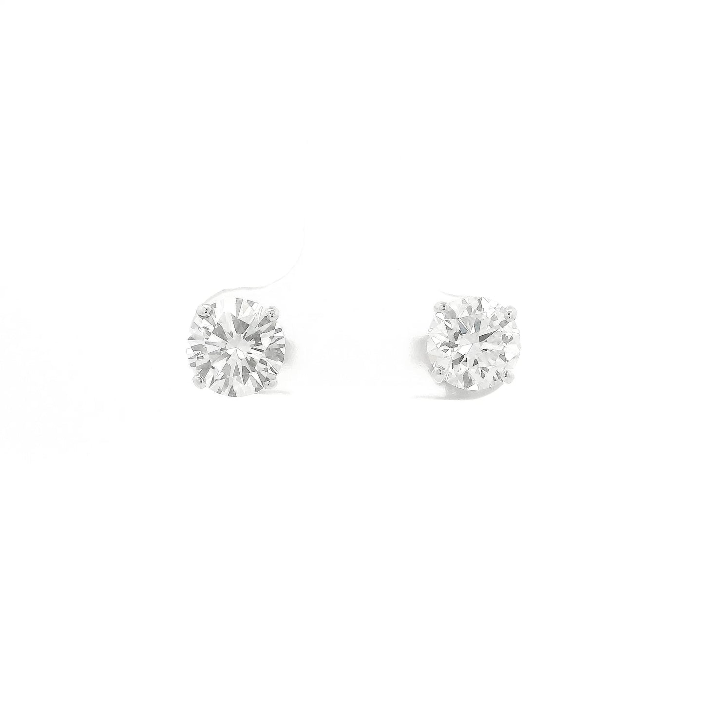 A Pair of White Gold Stud Earrings with 4 prong set round cut natural Diamonds at Forever Rox Fine Jewelry, Lake Tahoes Best Jewelry Store