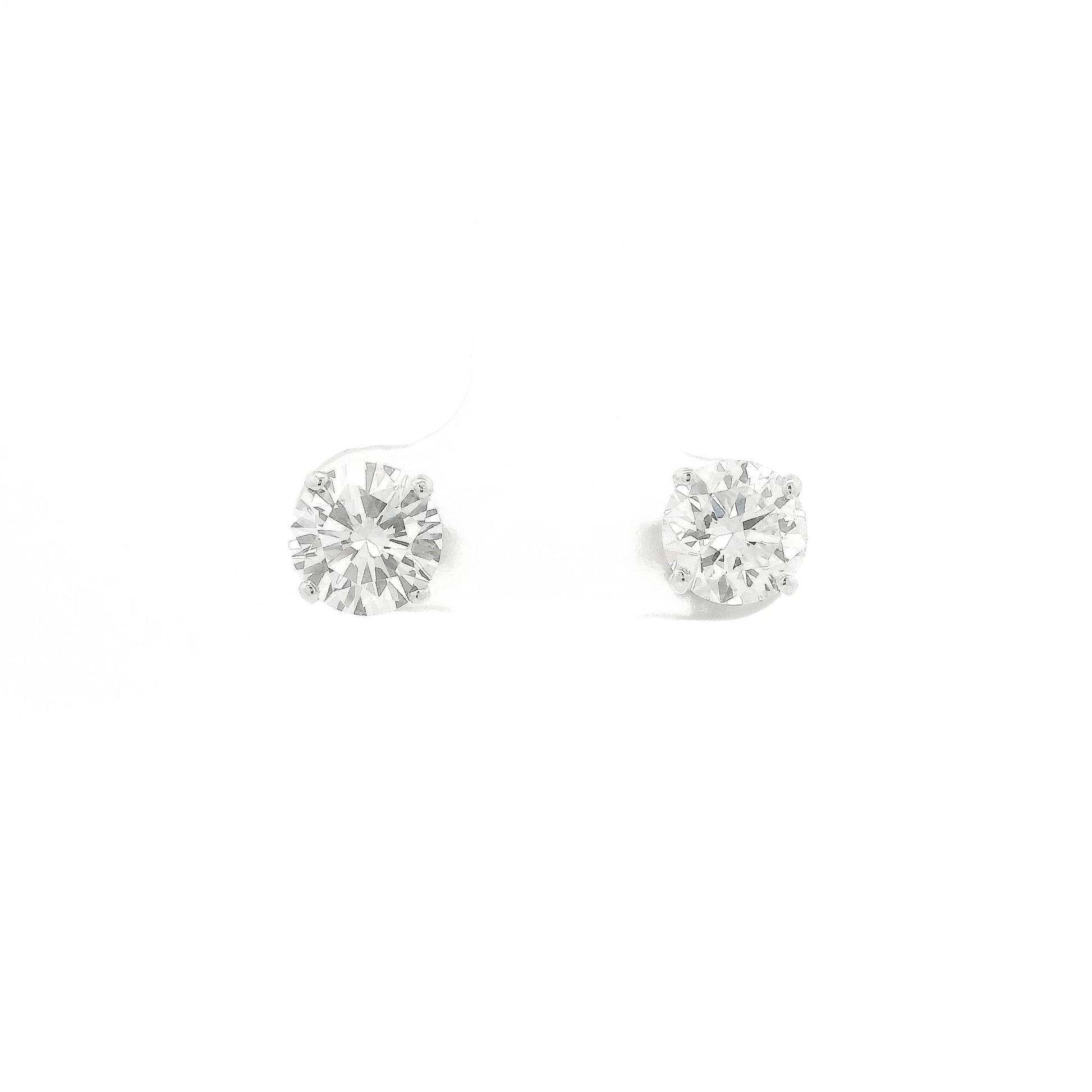 A Pair of White Gold Stud Earrings with 4 prong set round cut natural Diamonds at Forever Rox Fine Jewelry, Lake Tahoes Best Jewelry Store