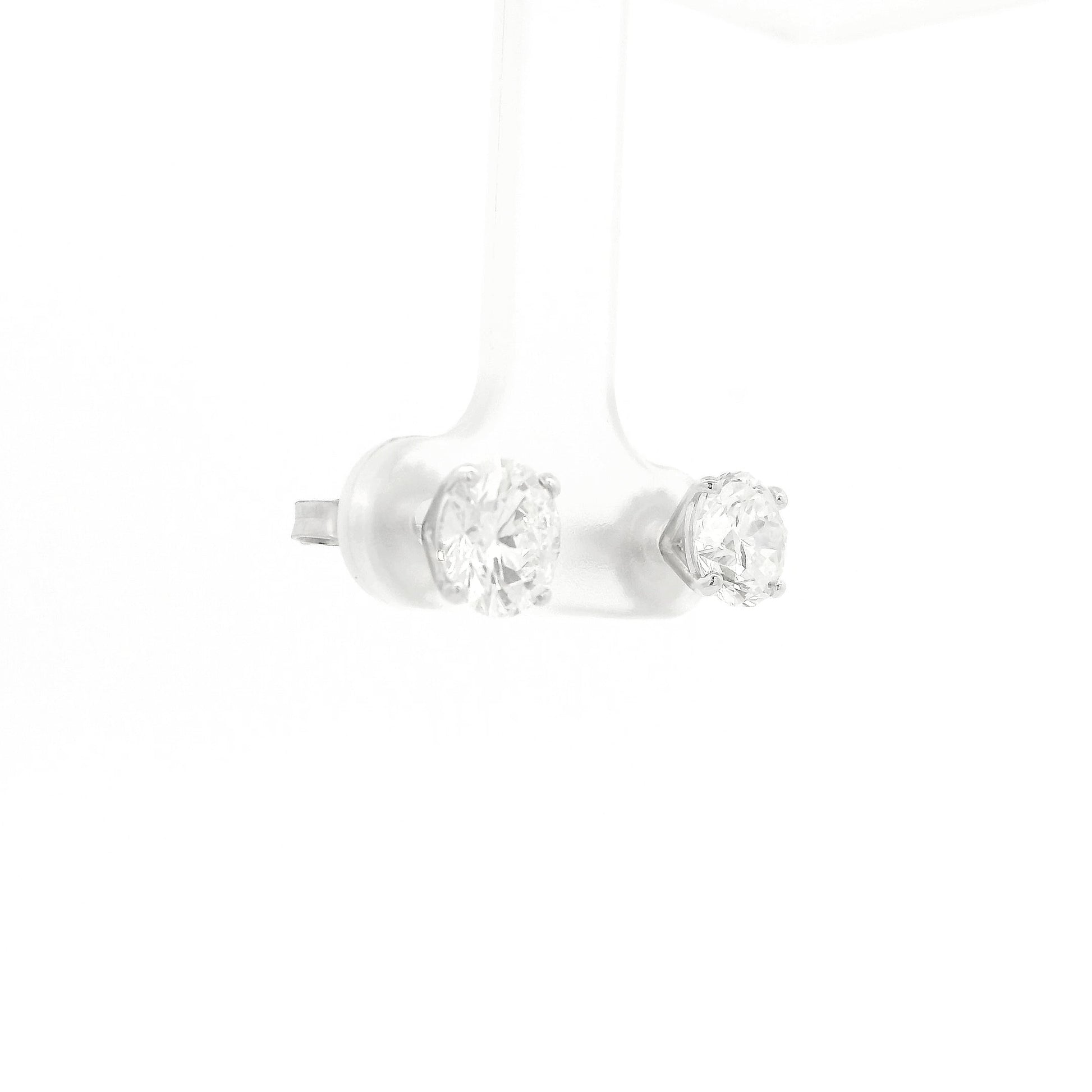 A Pair of White Gold Stud Earrings with 4 prong set round cut natural Diamonds at Forever Rox Fine Jewelry, Lake Tahoes Best Jewelry Store