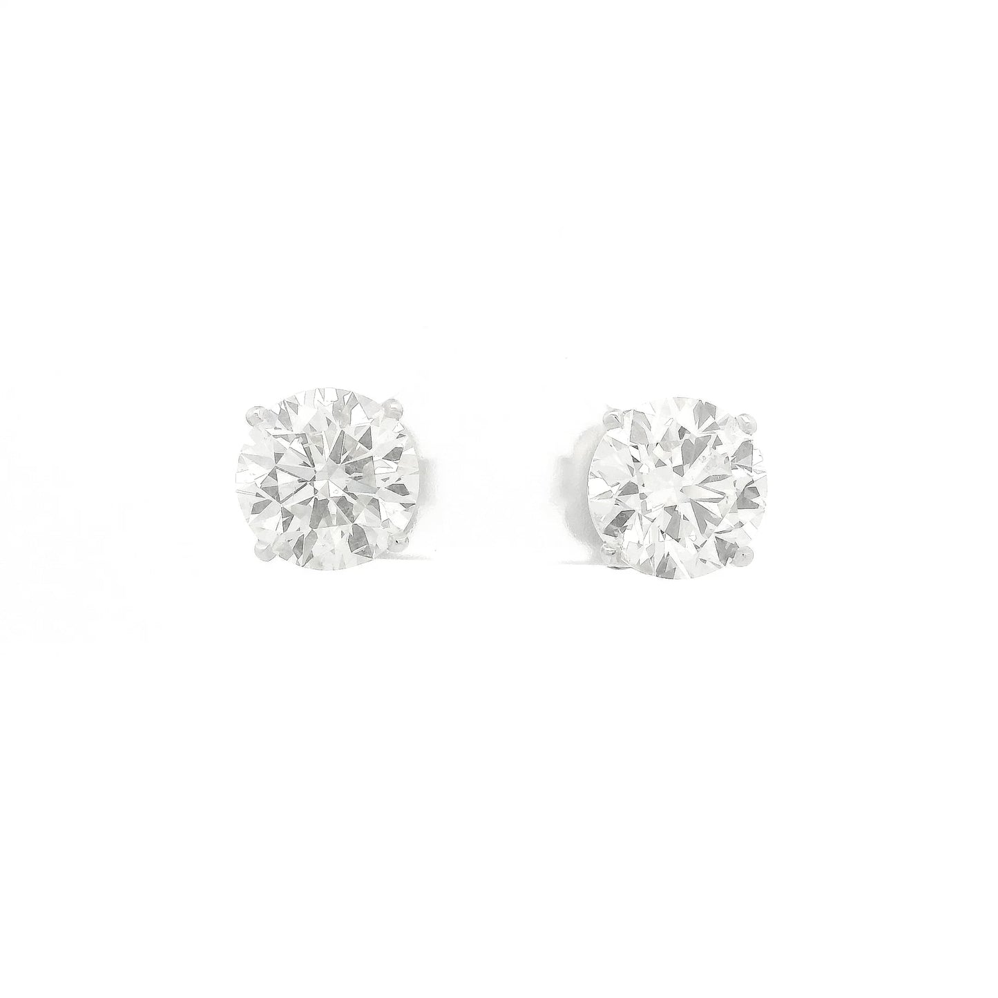 A Pair of White Stud Gold Earrings Natural Round Cut 3.01ct Each Diamonds at Forever Rox Fine Jewelry, Lake Tahoes Best Jewelry Store