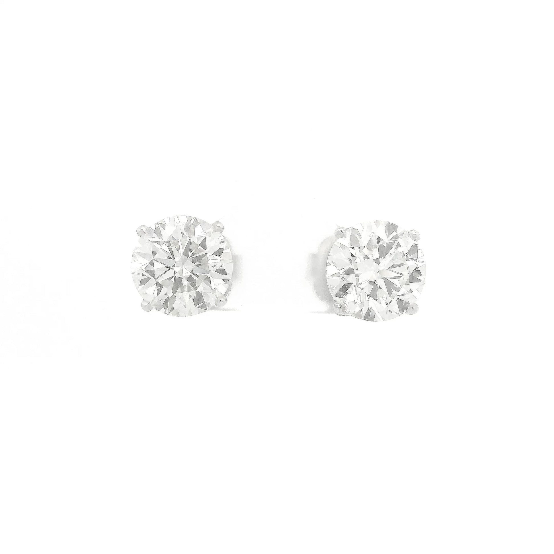 A Pair of White Stud Gold Earrings Natural Round Cut 3.01ct Each Diamonds at Forever Rox Fine Jewelry, Lake Tahoes Best Jewelry Store