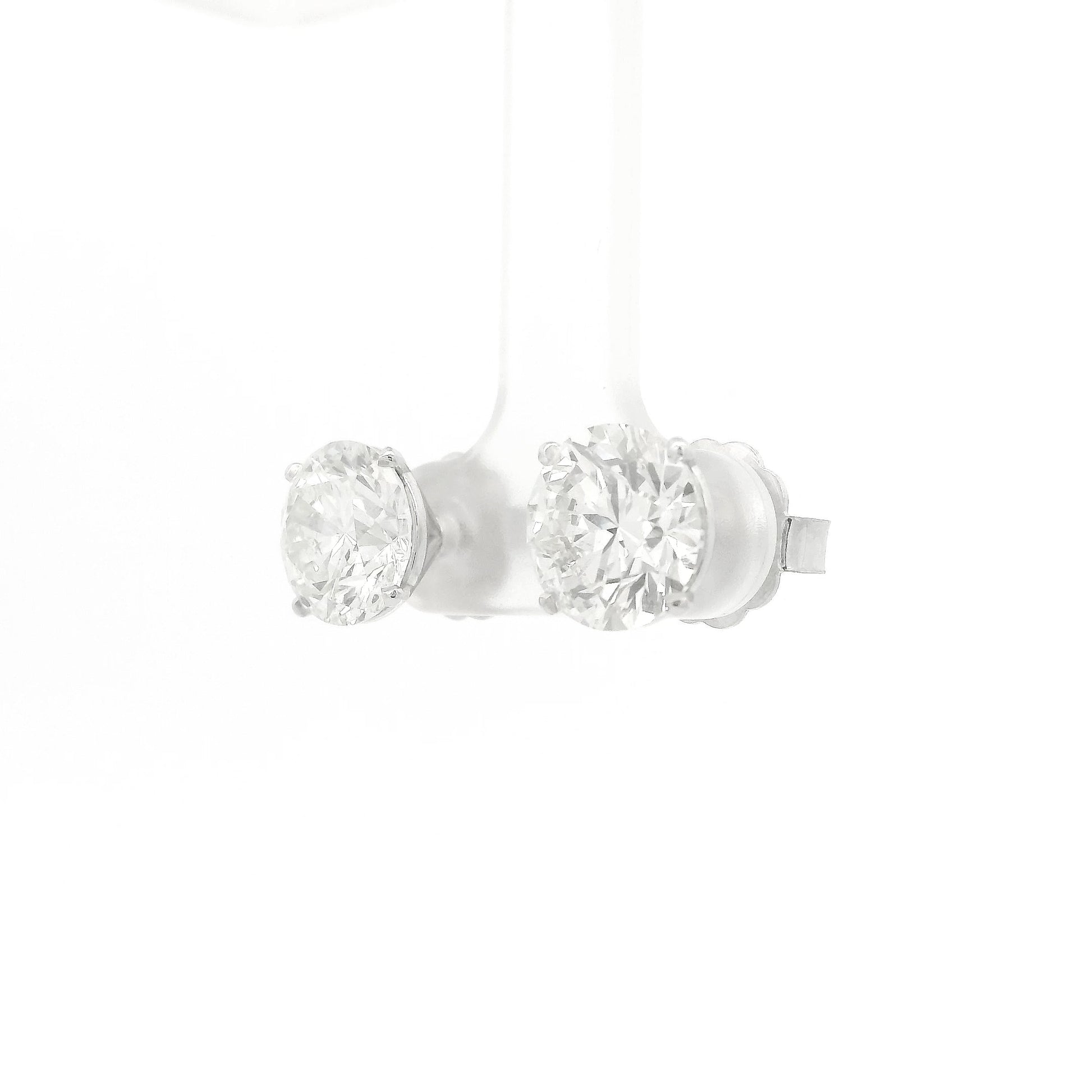 A Pair of White Stud Gold Earrings Natural Round Cut 3.01ct Each Diamonds at Forever Rox Fine Jewelry, Lake Tahoes Best Jewelry Store
