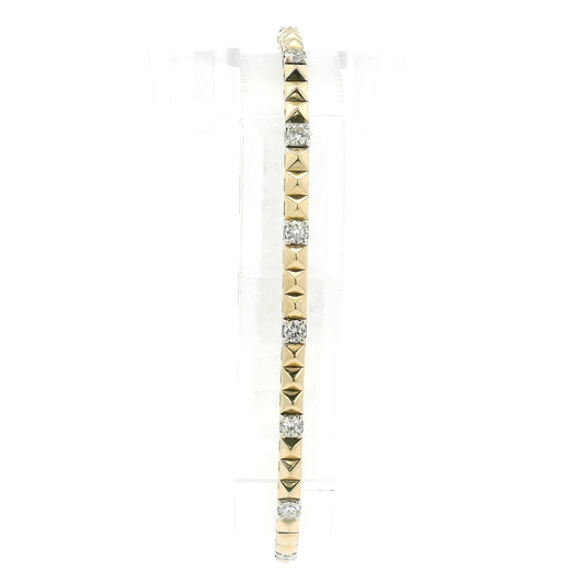 A Yellow Gold Flex Bangle Bracelet with spikes & natural Diamonds at Forever Rox Fine Jewelry, Lake Tahoes Best Jewelry Store