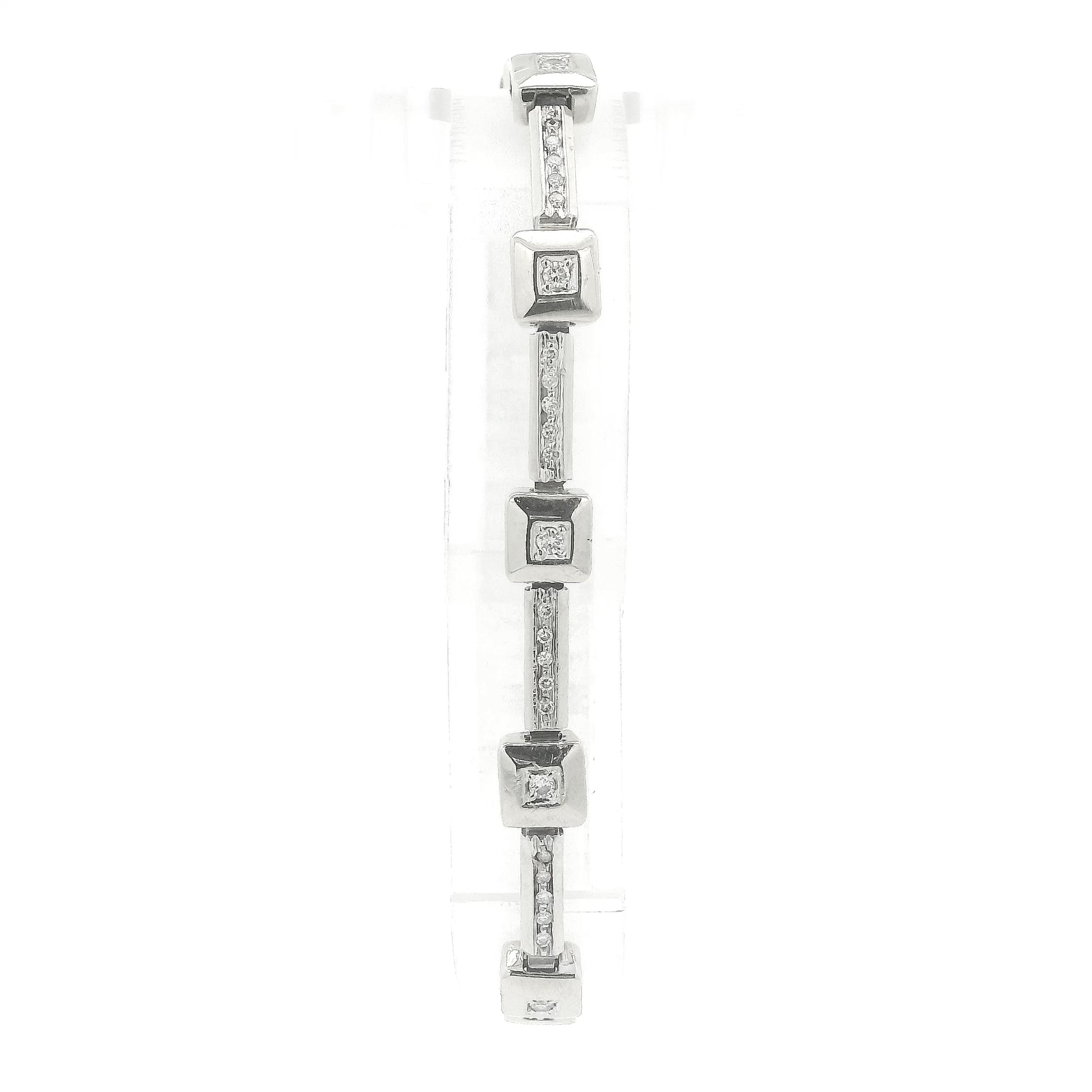 A White Gold diamond tennis bracelet with square bezel set & channel set diamonds at Forever Rox Fine Jewelry, Lake Tahoes Best Jewelry Store
