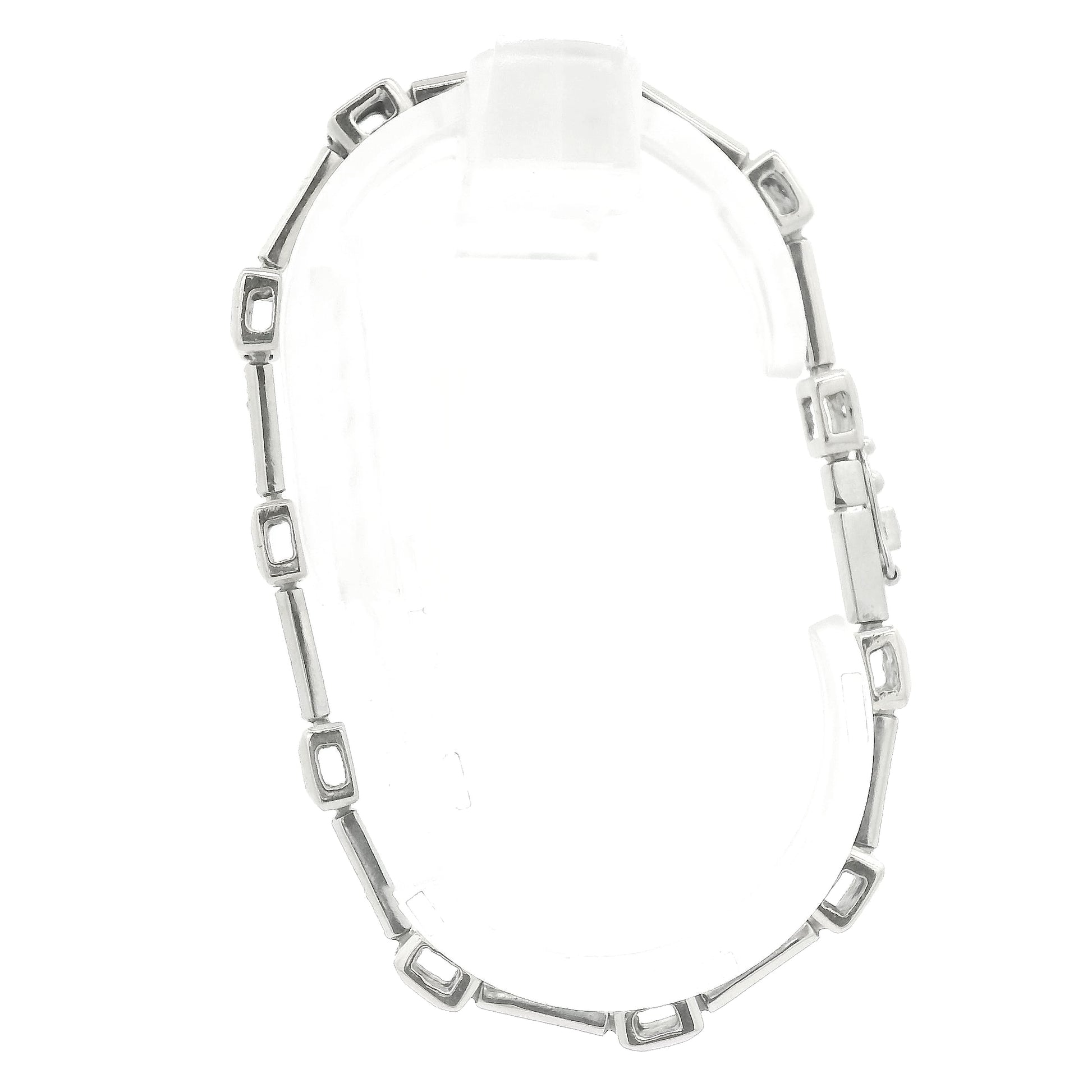 A White Gold diamond tennis bracelet with square bezel set & channel set diamonds at Forever Rox Fine Jewelry, Lake Tahoes Best Jewelry Store