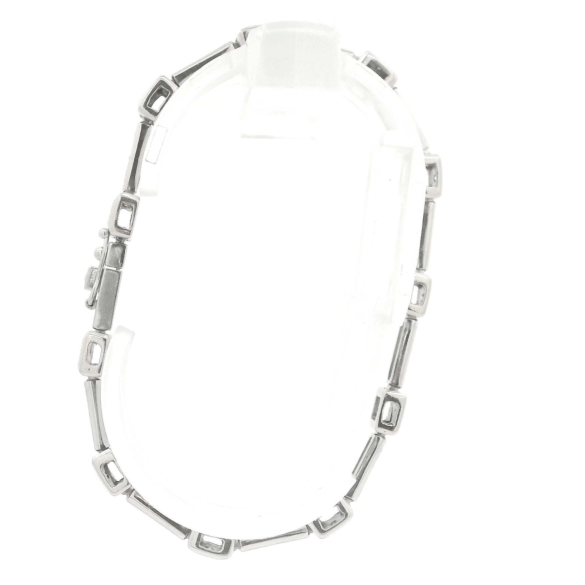 A White Gold diamond tennis bracelet with square bezel set & channel set diamonds at Forever Rox Fine Jewelry, Lake Tahoes Best Jewelry Store