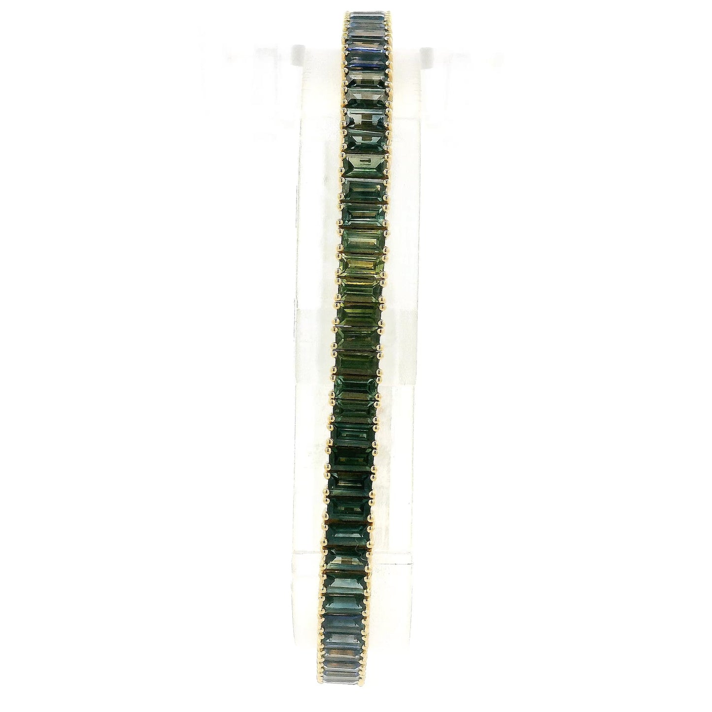 A Yellow Gold Bracelet with baguette cut green & blue natural Sapphires at Forever Rox Fine Jewelry, Lake Tahoes Best Jewelry Store
