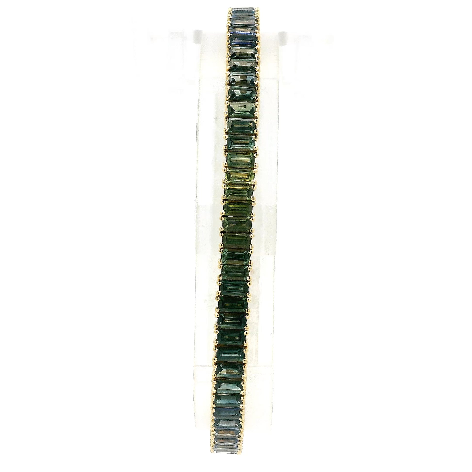 A Yellow Gold Bracelet with baguette cut green & blue natural Sapphires at Forever Rox Fine Jewelry, Lake Tahoes Best Jewelry Store