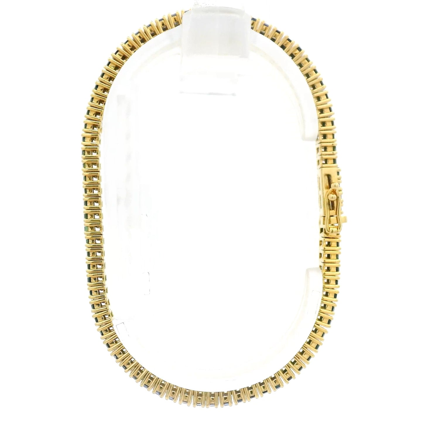 A Yellow Gold Bracelet with baguette cut green & blue natural Sapphires at Forever Rox Fine Jewelry, Lake Tahoes Best Jewelry Store