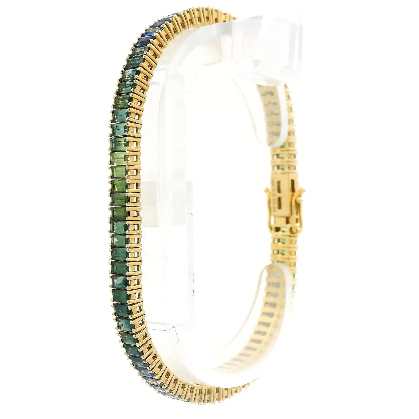 A Yellow Gold Bracelet with baguette cut green & blue natural Sapphires at Forever Rox Fine Jewelry, Lake Tahoes Best Jewelry Store