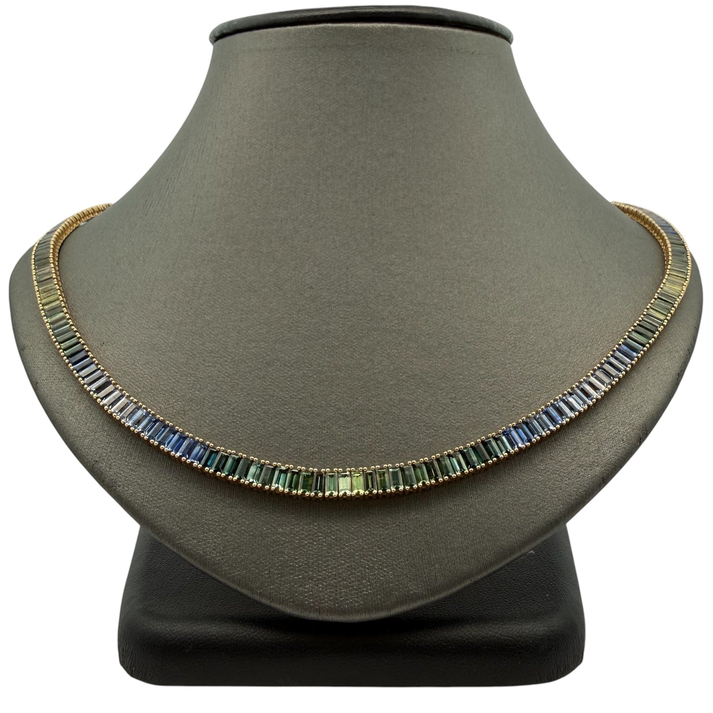 A Yellow Gold Necklace with a baguette cut natural green & blue Sapphires at Forever Rox Fine Jewelry, Lake Tahoes Best Jewelry Store