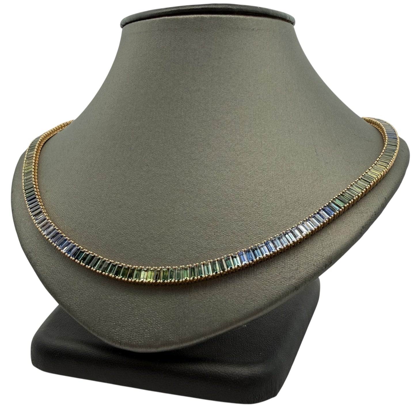 A Yellow Gold Necklace with a baguette cut natural green & blue Sapphires at Forever Rox Fine Jewelry, Lake Tahoes Best Jewelry Store