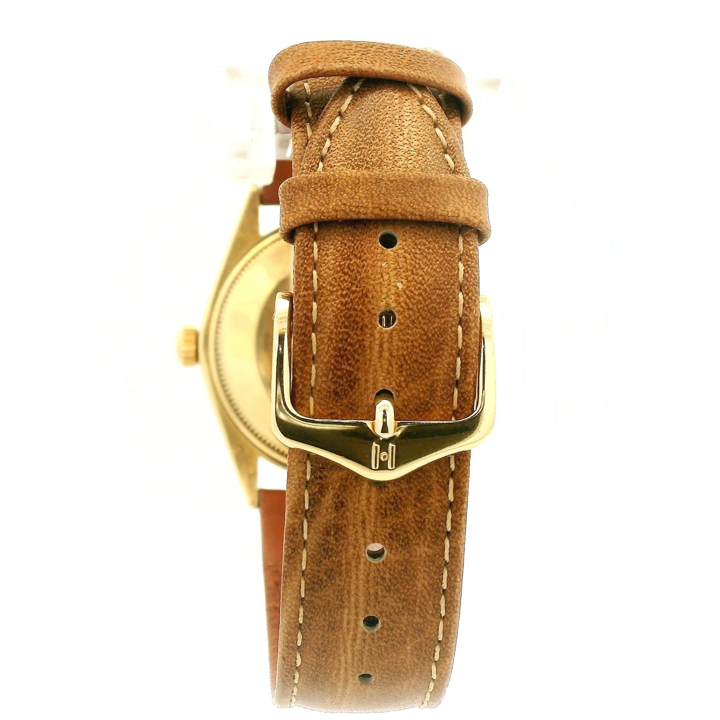 A vintage Rolex Oyster Perpetual watch with a gold-tone case, cream-colored dial, and a brown leather strap, shown against a plain white background at Forever Rox Fine Jewelry, Lake Tahoes Best Jewelry Store