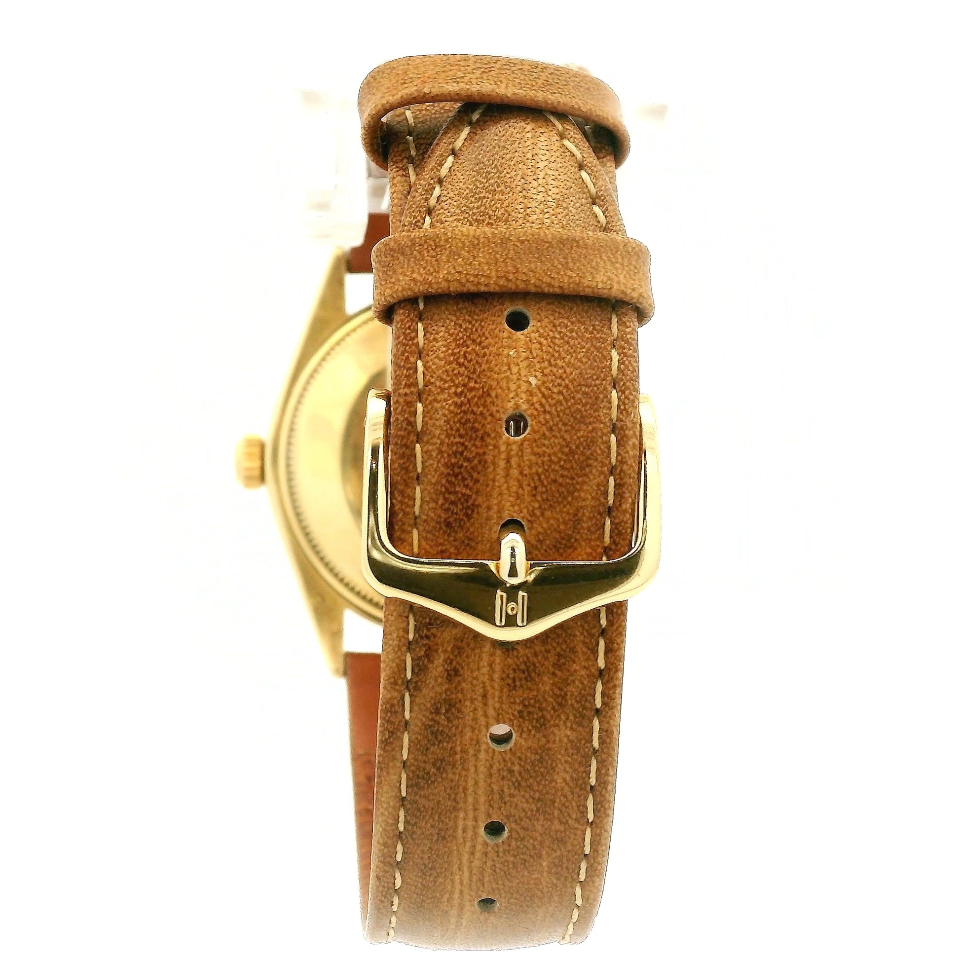 A vintage Rolex Oyster Perpetual watch with a gold-tone case, cream-colored dial, and a brown leather strap, shown against a plain white background at Forever Rox Fine Jewelry, Lake Tahoes Best Jewelry Store