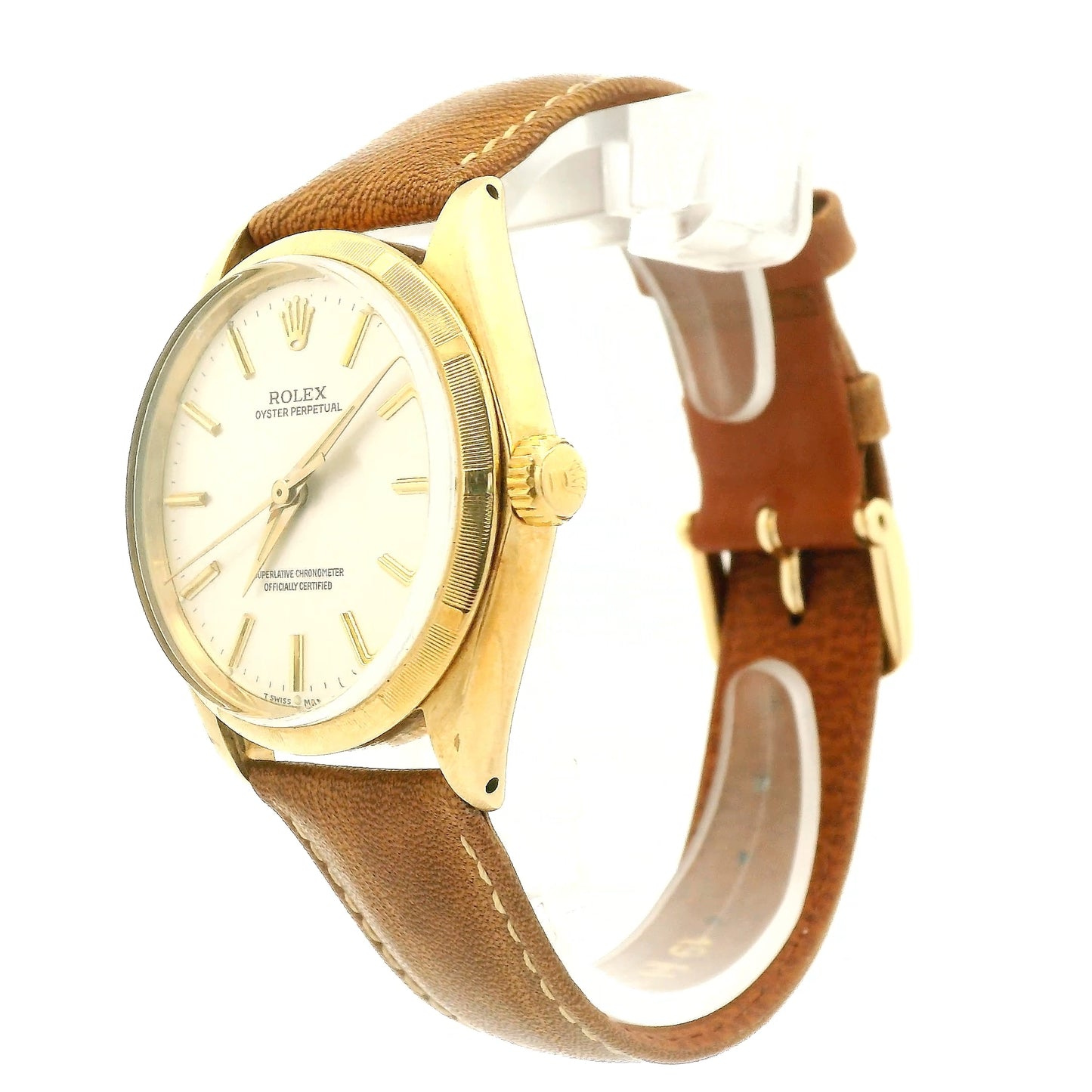 A vintage Rolex Oyster Perpetual watch with a gold-tone case, cream-colored dial, and a brown leather strap, shown against a plain white background at Forever Rox Fine Jewelry, Lake Tahoes Best Jewelry Store