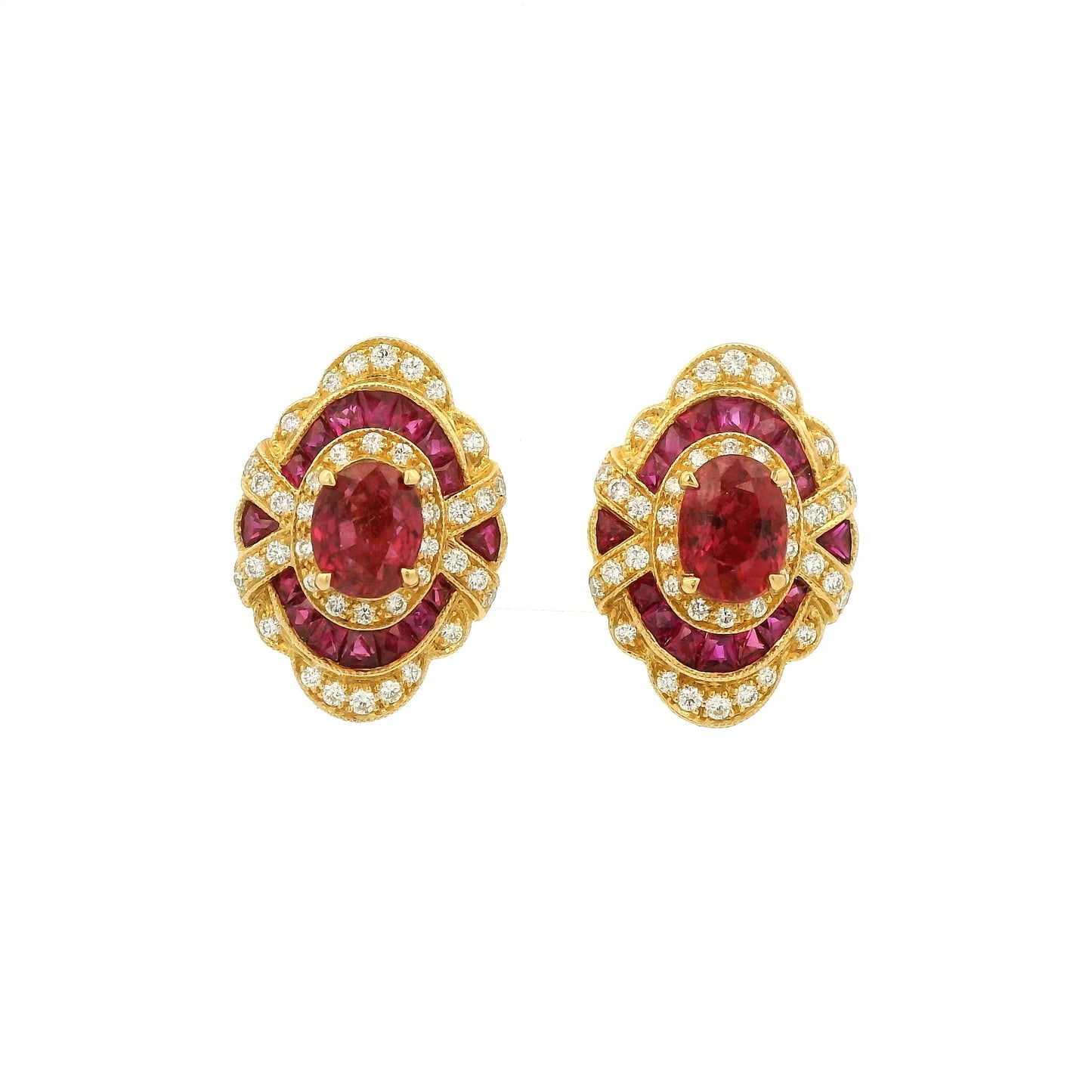A Pair of Yellow Gold Earrings with prong set oval cut natural Rubies in the center with french cut rubies and diamonds around them at Forever Rox Fine Jewelry, Lake Tahoes Best Jewelry Store
